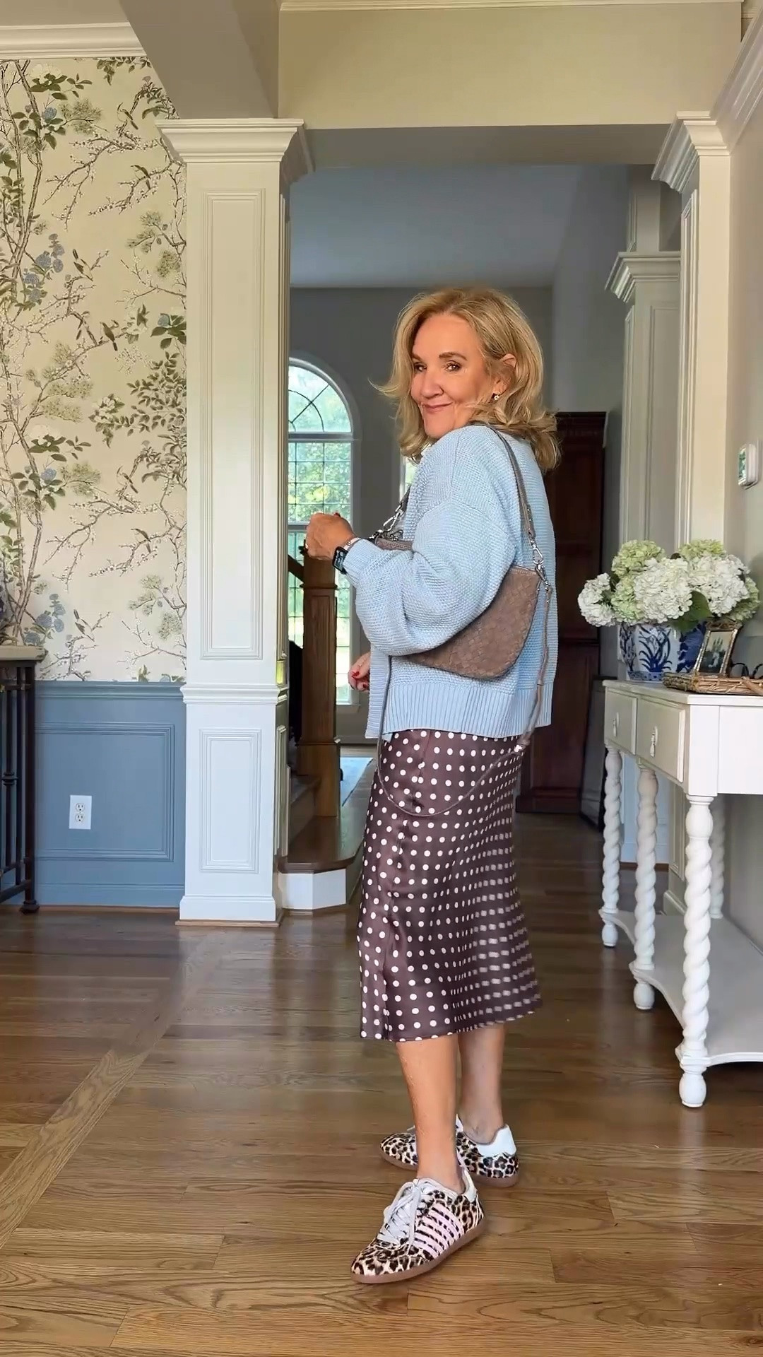 I think the mix of a cozy sweater with a silky skirt is what makes this one so good. I’m wearing a medium in both, and those playful shoes keep it from feeling too serious.

#LTKootd #LTKgrwm #LTKOver40