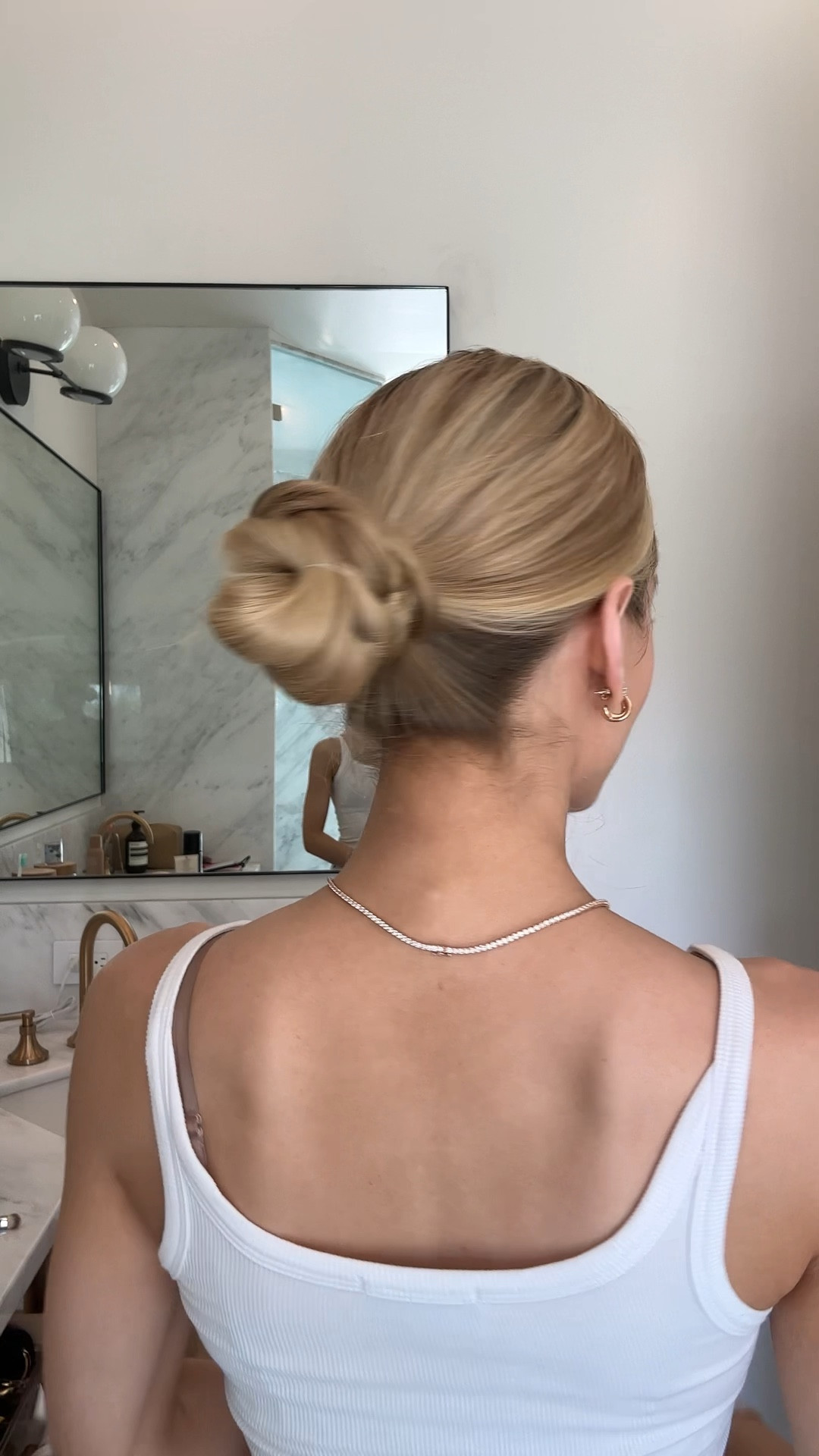 Dirty hair day bun - a simple braided around low bun that works every time! Linking my go to hair styling products and everything used here

#LTKBeauty