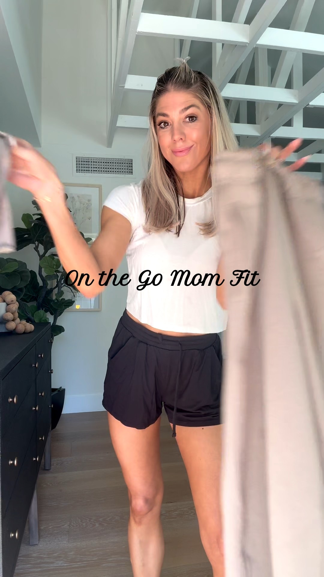 Perfect on the go Mom fit! Love those two piece sweat set from Revolve x Superdown. Wearing XS. Paired it some sneakers, a baseball cap and my Dagne Dover phone bag 

#LTKmomlife #LTKgrwm #LTKootd