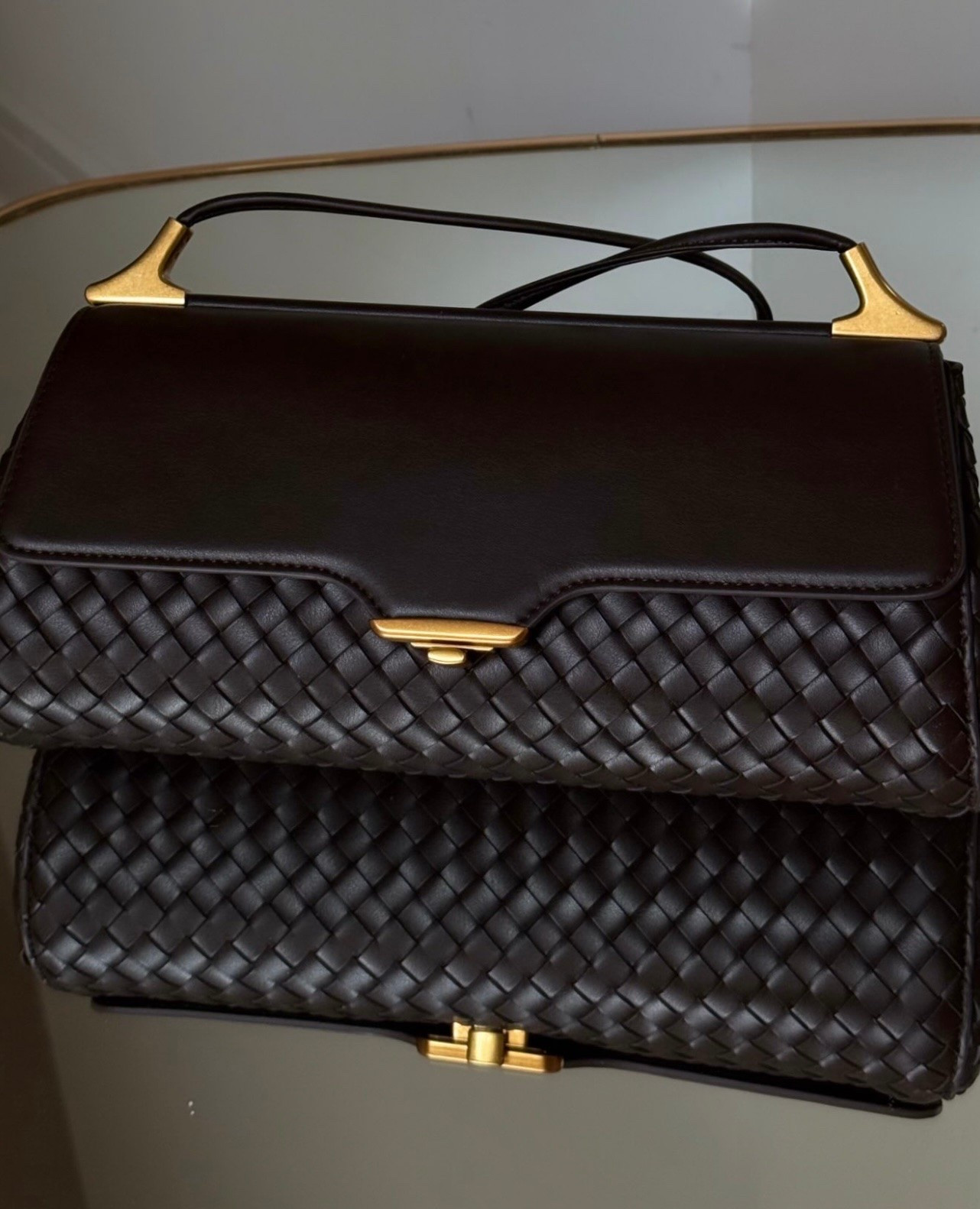 Amazon find 🤎
Proof that you don’t have to spend a fortune for a bag that looks this chic. The woven detail, rich chocolate brown and gold hardware give it such a luxe look. 
Looks designer. Priced Amazon. Love that.

#LTKU #LTKOver40