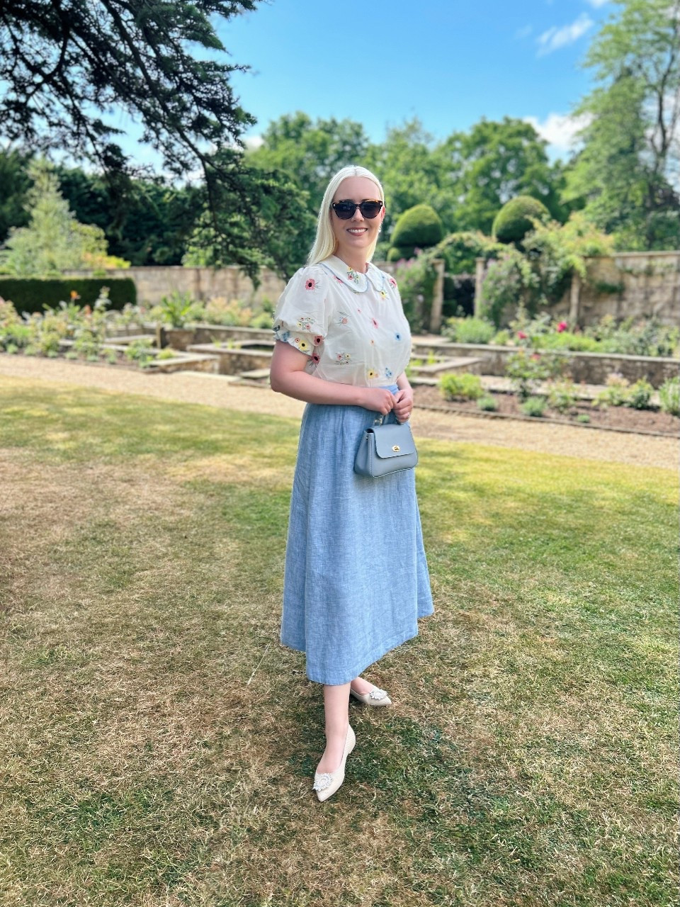First time wearing my new Ivy Embroidered Blouse with Pan Collar from Joanie Clothing (see previous post for close up) & I LOVE! I partnered with a blue linen skirt by Boden and blue leather Mini Holly top handle bag by Tusting (not on LTK) and pointed flats by Pretty Ballerinas. I’ve added a selection of skirts, trousers and shoes that would be perfect with this blouse 🌸 

#LTKsummer #LTKeurope #LTKuk
