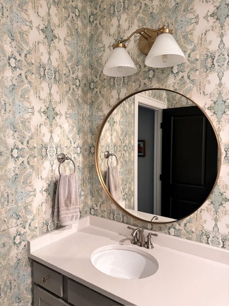 Elevate your guest bathroom with charm and affordability! Obsessed with this wallpaper and it won't break the bank! The mirror adds a touch of elegance, accentuated by perfect lighting!

#LTKHome #LTKFindsUnder50 #LTKFindsUnder100
