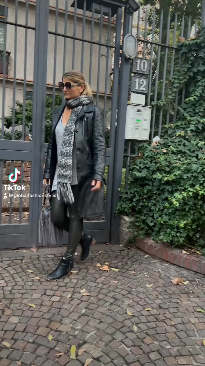 Fitcheck in Monochrome 🖤🩶🤎

Today’s OOTD is all about embracing the sleek elegance of black, grey, and silver tones. Perfect for winter, this ensemble combines edgy elements with cozy details for a look that’s effortlessly chic.

✨ Style Tips:

	1.	Play with Proportions: A long black leather trench creates a striking silhouette, especially when paired with fitted leggings and ankle boots.
	2.	Monochromatic Magic: Stick to a streamlined color palette for a sophisticated vibe.
	3.	Sparkle Wisely: Add silver accents with chic earrings and a glittery scarf for a touch of glamour.
	4.	Warm Contrast: Use brown accessories, like Miu Miu glasses, to introduce subtle warmth.
        5.	Mix Fabrics and Textures: Combine smooth leather, sleek leggings, and a soft knit scarf with glitter to add depth and interest to your look. The velvet bag adds a luxurious touch to the ensemble.

💄 Beauty Tip: Keep your hair sleek in a ponytail to highlight those chic silver earrings.
Follow and like for more ✨❤️

👢 OOTD 

	•	Long black leather trench @vestiaireco 
	•	Dark grey shiner leggings @calzedonia 
	•	Oversized long knit scarf with glitter @vinted 
	•	Black ankle boots
	•	Brown Miu Miu glasses @miumiu 
	•  Grey velvet bag @liujo 

Need some guidance to perfect your style? Whether you’re online or planning a trip to Milan, book a free 15-minute call with a stylist to discuss your fashion needs. Let’s elevate your wardrobe together! ✨

📞 Link In bio ✨💞

#Fitcheck #OOTD #WinterFashion #MonochromeMagic #StyleInspo #FashionTips #ChicAndCozy #ElegantStyle #Fashionista #StylistCall #MilanFashion #FollowForMore #fashionstylist #monochromatic #silver #grey #casualstyle #blackleatherjacket