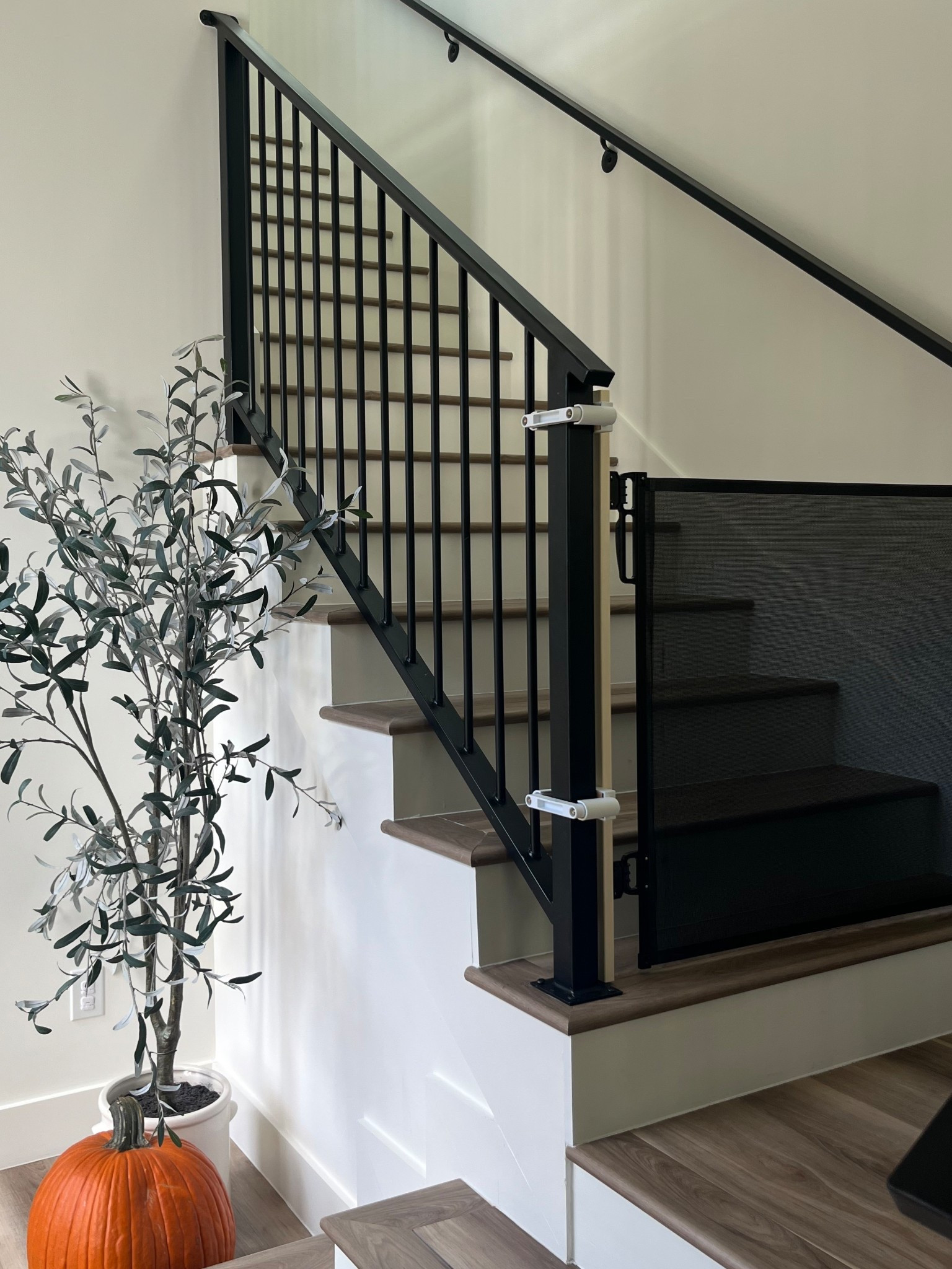 So many questions on our baby gate! We added an adaptor so that we could make it work with our railing. 

#LTKBaby #LTKKids