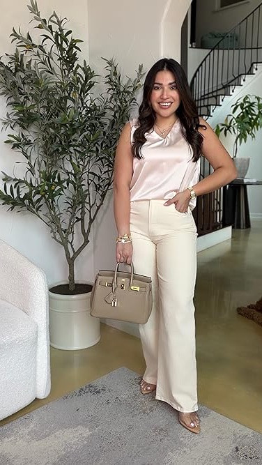 This satin v neck tank is one of those pieces that instantly makes an outfit feel more expensive ✨

Easy to dress up with a skirt and heels, but also so good with jeans for a simple elevated look. The satin finish is so pretty, the fit is flattering, and it is one of those closet staples you can style so many ways.

Wearing:
Satin Tops S does run small so size up 
Skirt M
Heels 7.5

Linked everything here 🤍

#LTKfashion #LTKstyletip #LTKunder100 #satinblouse #satintop #elevatedbasics #closetstaples #petitefashion #outfitideas #datenightoutfit #summeroutfits #jeansoutfit #skirtoutfit #affordablefashion #everydaystyle
