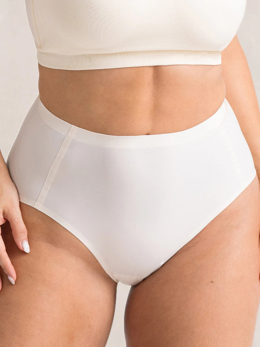 Truekind® Seamless Stretch Mid-Waist Brief | Shapermint