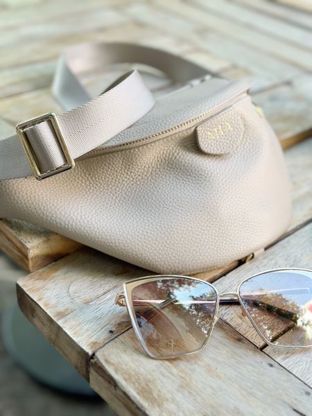 I’ve been doing so much traveling lately and decided I needed a convenient bag for travel.

I never thought I would use this type of crossbody but I am loving it! 

And these are my favorite sunglasses.

#travelbag #crossbody #fannypack #bumbag #travelpurse #sunglasses

#LTKstyletip #LTKGiftGuide #LTKtravel