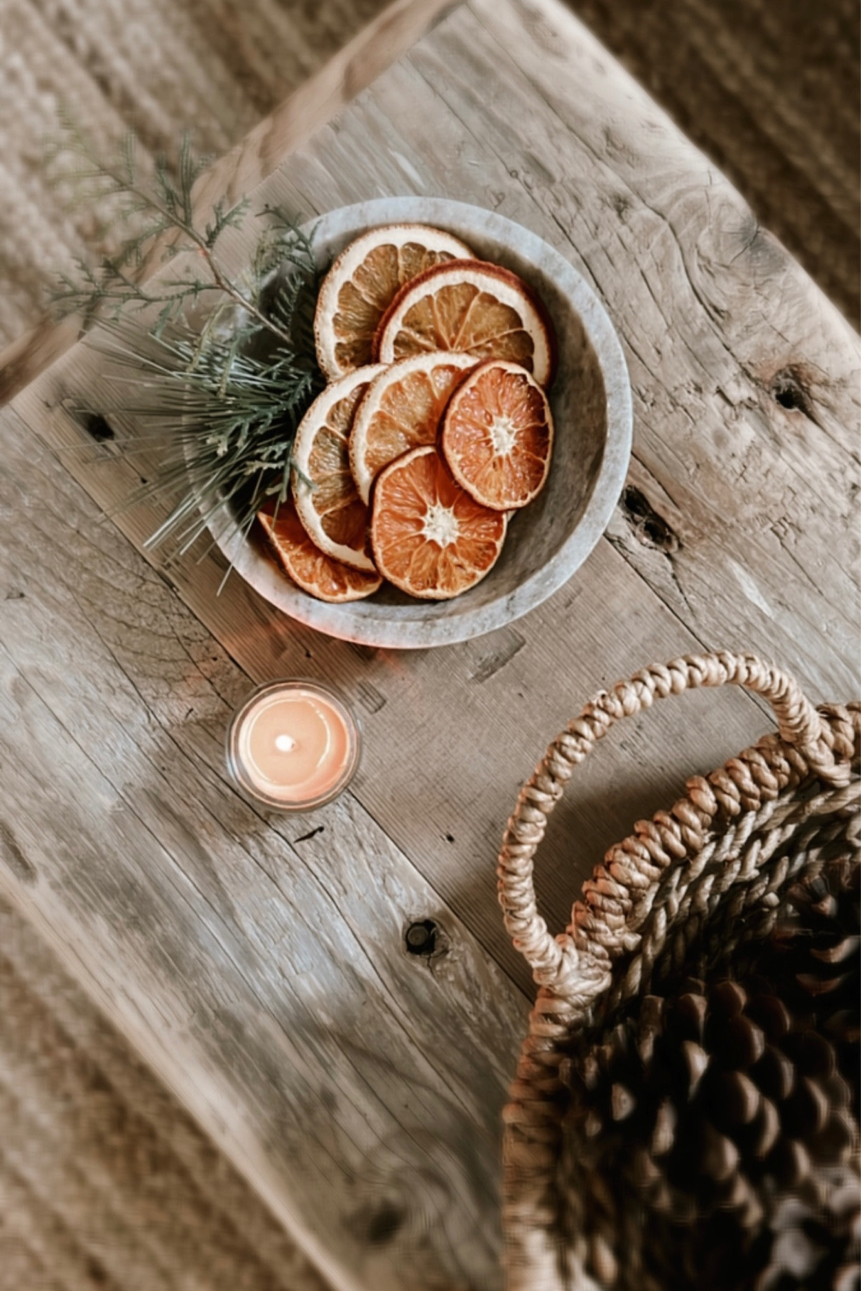 Seasonal coffee table decor • holiday coffee table styling • dried fruit decor • woven tray • decorative tray • scandi decor • scandi Christmas 

#LTKhome #LTKSeasonal #LTKHoliday