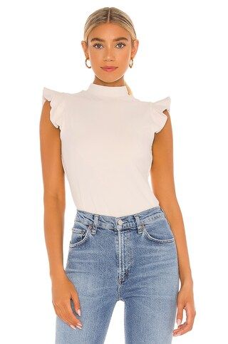 Susana Monaco Ruffle Mock Neck Top in Blanched Almond from Revolve.com | Revolve Clothing (Global)