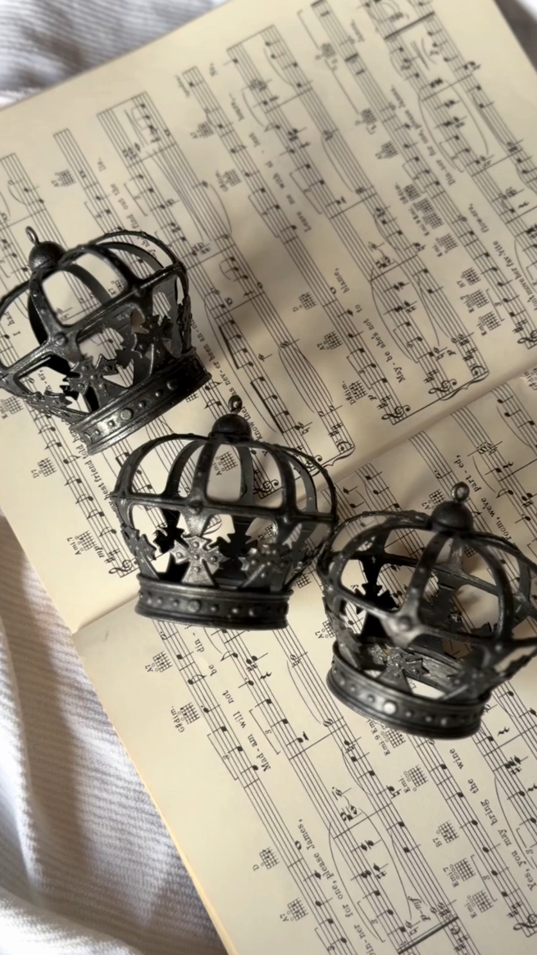 Old World Christmas will always have my heart. ✨

I've been giving  ornaments new life with layered finishes inspired by antique European ironwork. The aged gunmetal patina feels like something discovered in a centuries-old château, and I love how dramatic they look mixed with greenery, velvet ribbon, and candlelight.

I'm linking these crown ornaments and other Old World Christmas favorites that capture this same timeless style.

🖤 Save this for your Christmas decorating inspiration.

#LTKSeasonal #LTKHome #LTKOver40