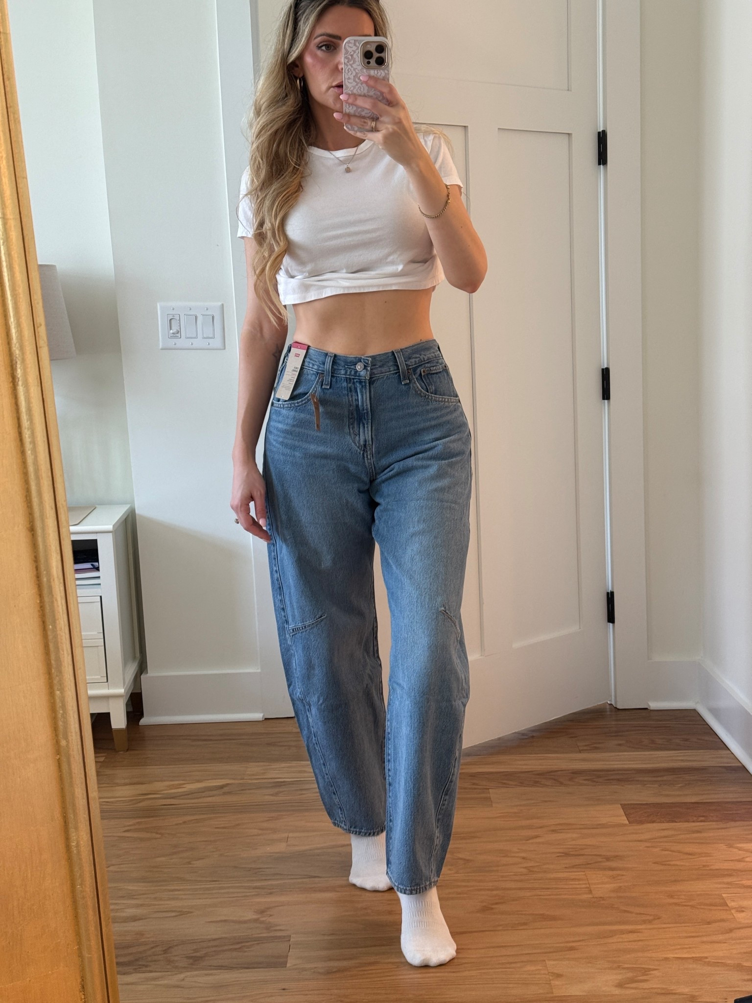 Levi’s now makes the viral CINCH waist jeans in a barrel jean (and even available in LONG size!) 
I’m wearing the 28 waist (and the cinch makes it like a 27 when they are snapped smaller) with the 33” inseam for tall girls. 
I’m 5’9 for reference 

#LTKTall #LTKootd #LTKOver40