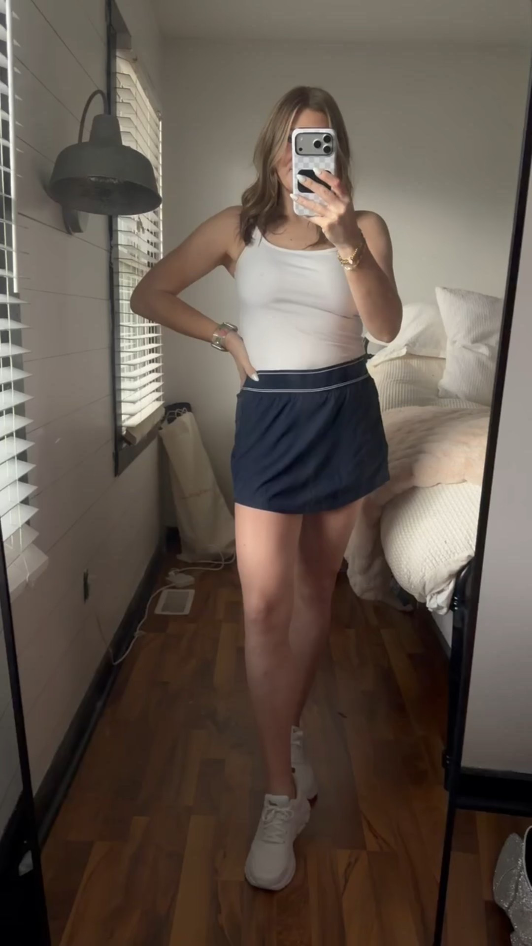 This athletic skirt with a white tank is such a clean and easy outfit for everyday wear. It gives that sporty, put together look while still being super comfortable, perfect for errands, walks, travel days, or casual weekends. 

athletic skirt outfit, white tank outfit, tennis skirt outfit, athleisure outfit ideas, sporty casual outfit, everyday activewear style, travel day outfit, comfortable summer outfit, clean girl outfit, effortless sporty style, SavannahK

#LTKmomlife #LTKActive #LTKootd