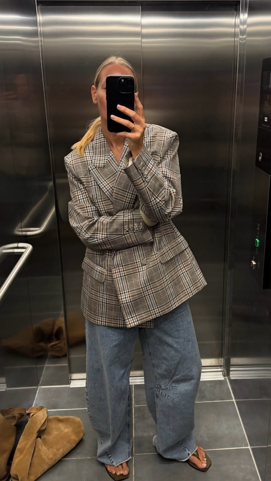 A check blazer ! You want sharp shoulders or at least wide shoulders and serious tailoring.
It can be a more boxy shape too, and it should be long. A short check blazer is also chic ( a la Chanel !) so if you see one grab it.

Look for a mix of brown, camel and black ( maybe a bit of blue) in the check with a white back ground. That means it will be totally versatile and go back with most pieces in your wardrobe.

#LTKaustralia #LTKspring