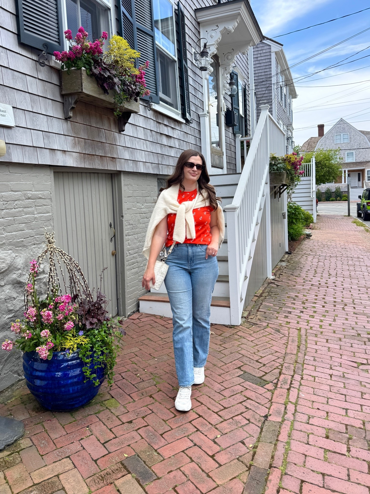 A perfect summer outfit for Nantucket! This anchor tee is so cute and I paired with jeans and a white sweater tied over top with white canvas sneakers.

#LTKootd #LTKSeasonal