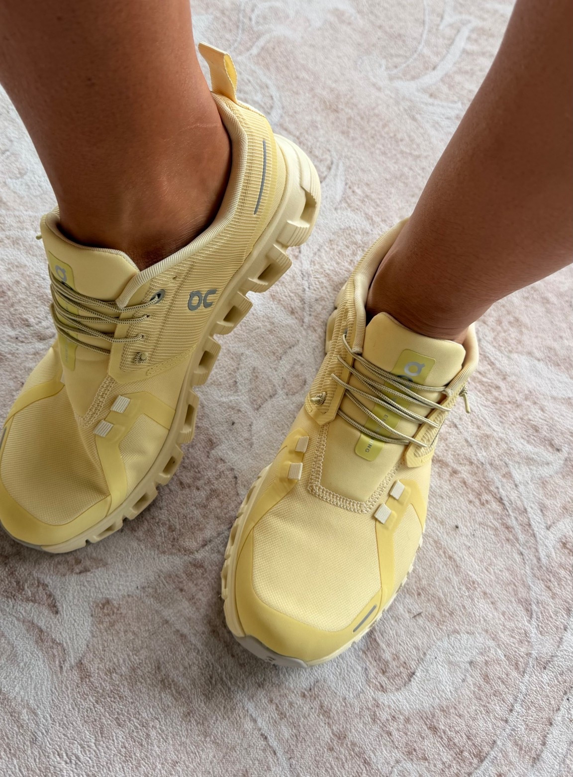 You will find me in these ON cloud buttery yellow sneakers all spring and summer 