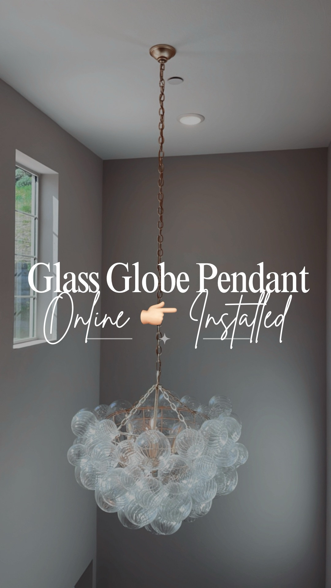 Swirled glass globe pendant light. This one is under $600 and makes a beautiful statement piece. 👏🏻

Perfect for an entryway with high ceilings. Would also look amazing over a dining table or bathtub. 🙌🏻

Adjustable length and for reference this is the larger (9 light option) of the two available sizes. 👍🏻

#lighting #bathroom #diningroom 

#LTKHome #LTKSaleAlert