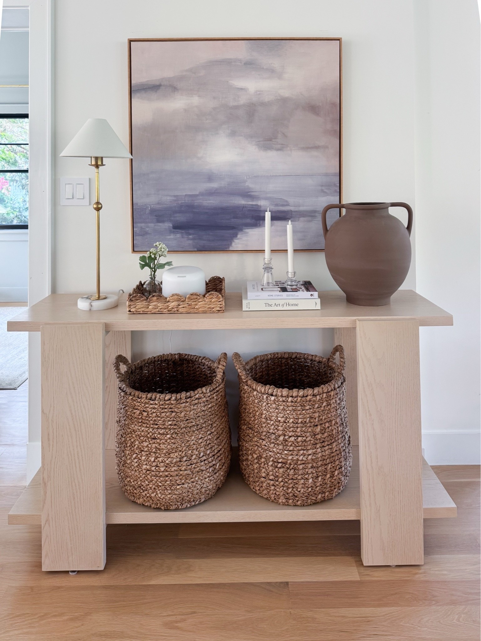An entry (or hallway) moment that feels equal parts beautiful and functional. I linked a similar 36x36 piece of artwork, my favorite oversized vase, and these woven baskets that are perfect for storing toys, blankets, or that inevitable pile of laundry waiting to head upstairs. The best styling pieces are the ones that work hard, too.