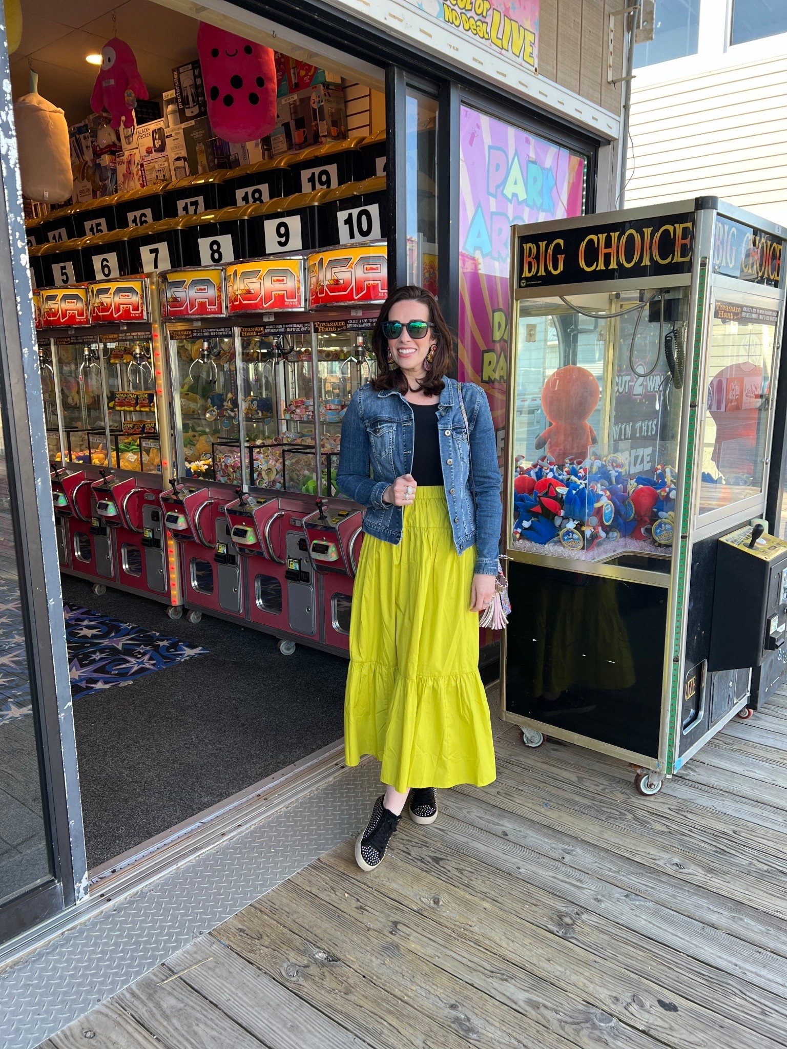 Denim jacket (4). Lime green tiered maxi skirt (s). Studded black sneakers (8.5). Black tshirt (s). #jacket #denimjacket #maxiskirt #skirt #limegreenskirt #tieredskirt #sneakers #studdedsneakers #blacksneakers #springoutfits 
spring outfits 2026 

#LTKootd #LTKSeasonal