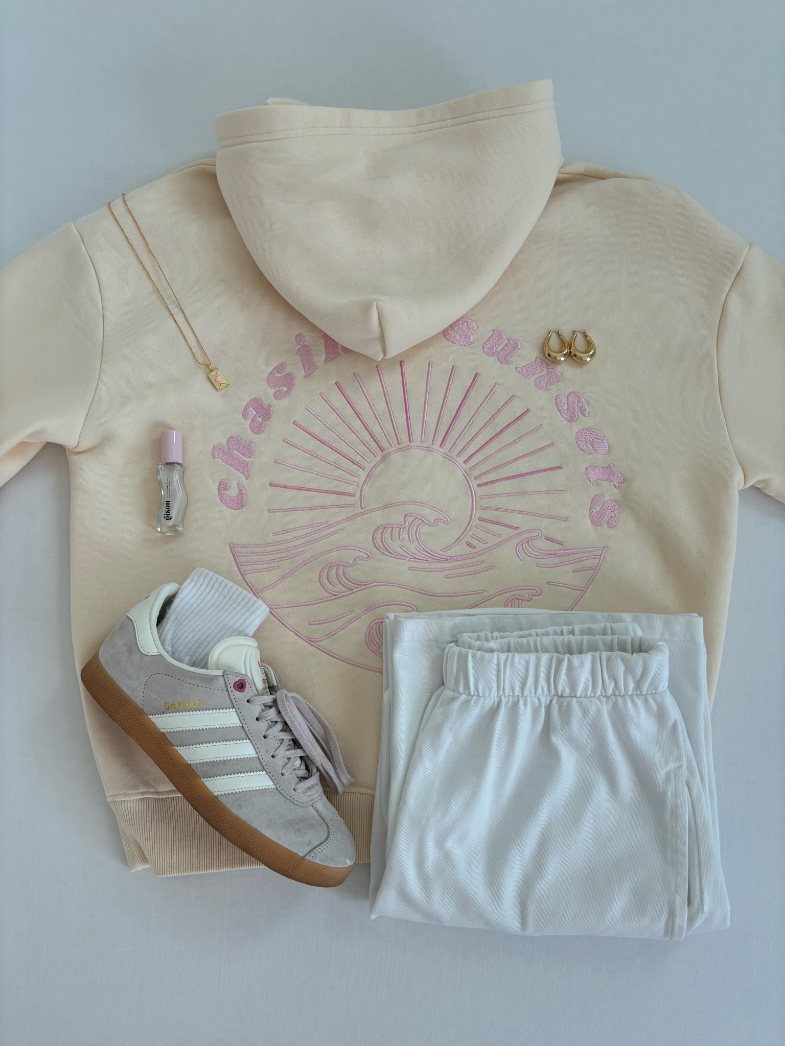 Hoodie is from Pink Palm Puff and necklace is from Evry Jewels 