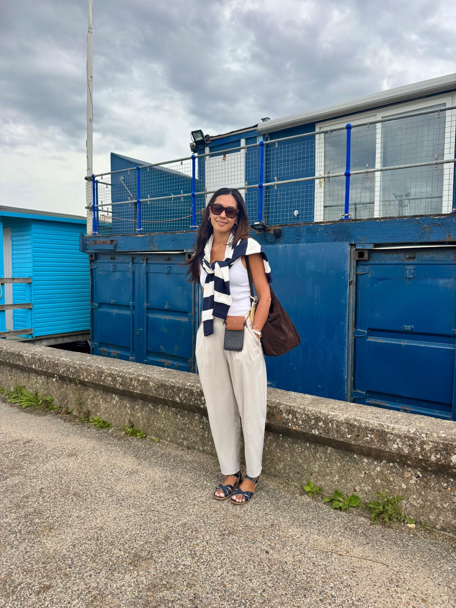 Coastal outfit for a day at Whitstable.
Exact items linked below and detailed description of my look
Top h&M size S
Sweat and Barrel leg trousers are both Sweaty Betty size S
Salt water sandals classic navy 
Celine phone pouch
Massimo suede tote 
Oliver Goldsmith Sunnies code Senor Snr

#LTKuk #LTKsummer #LTKeurope