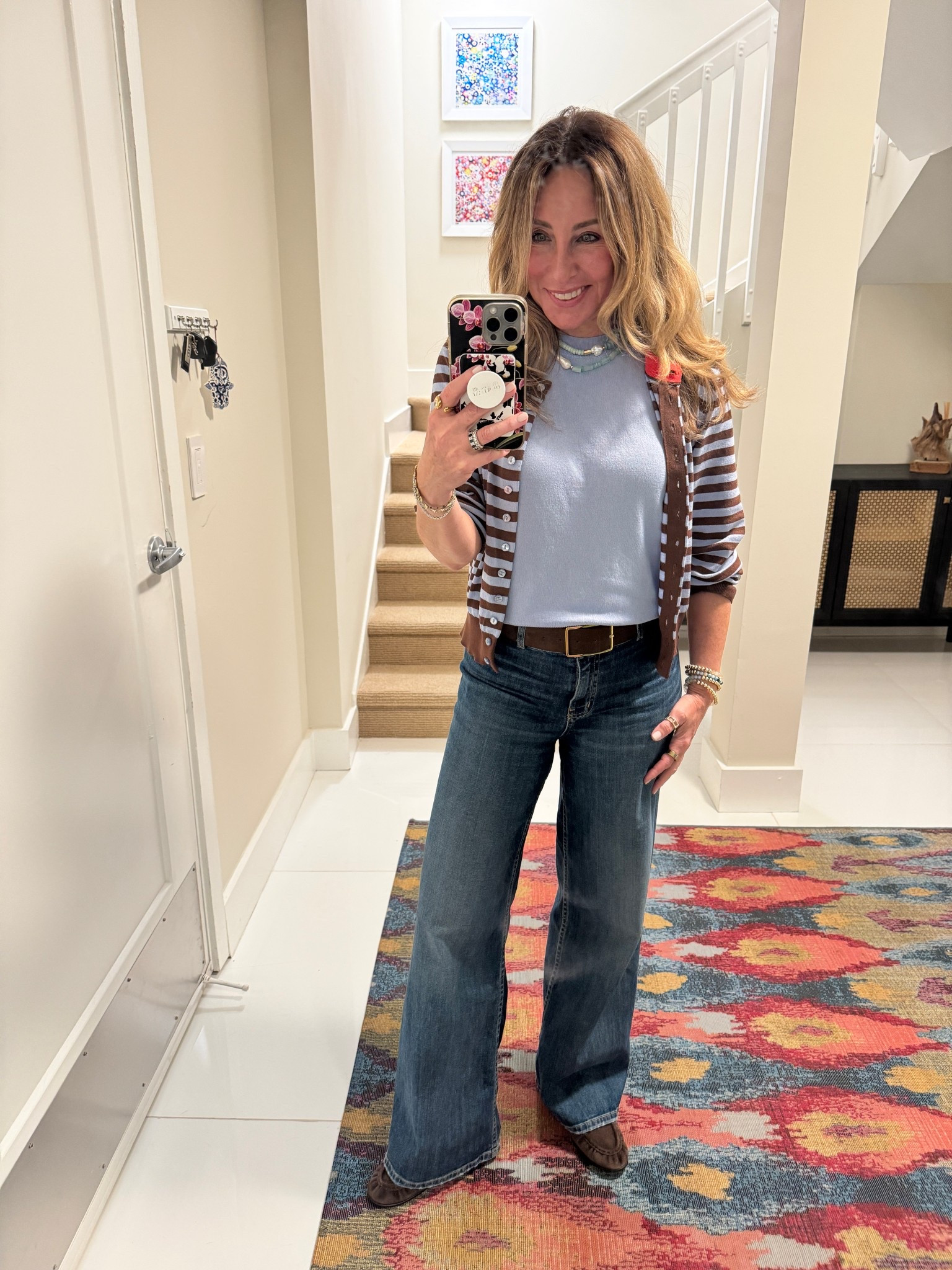 I swear I had almost this exact sweater set in 1995, I loved it so much, and then we went to dinner outside one night and a bird pooped on it. It was never the same, lol anyway this feels incredibly nostalgic yet very current at the same time. I love the blue and brown color combination. And pairing it with brown suede accessories feel spot on for this time of year. Remind me to talk more about these loafers next week. They’re incredible!

#LTKootd #LTKgrwm #LTKSpringSale