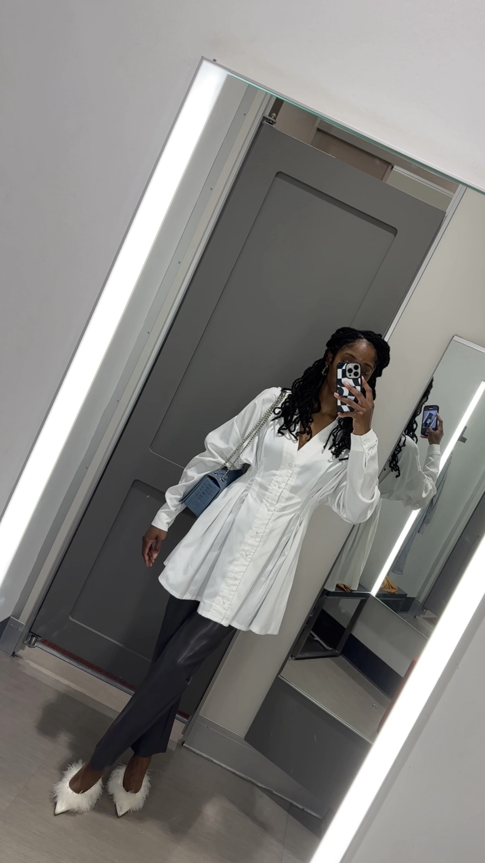 I reach for this shirt dress so often, it literally goes with everything!

The pleats elevate the top by giving it more of a tailored looks. While the oversized fit adds effortlessness.

Leather pants have been my go-to lately, so these were a steal when I got them on sale at Aritzia! 

The cutest statement shoes from Kendall Miles add the perfect amount of flare, and I loved adding my Brandon Blackwood bag for a pop of color 🩵

#LTKshoecrush #LTKstyletip