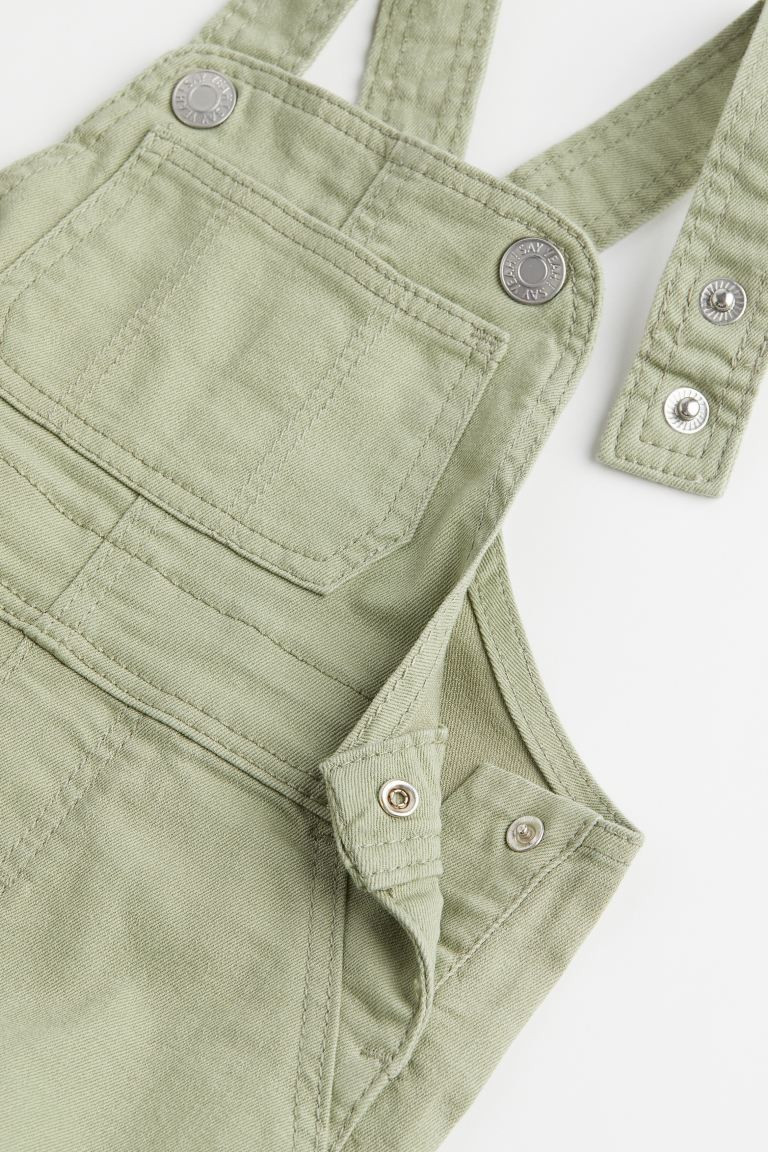 Overalls in twill. Suspenders with adjustable fastening, mock fly, and snap fasteners at gusset. ... | H&M (US + CA)