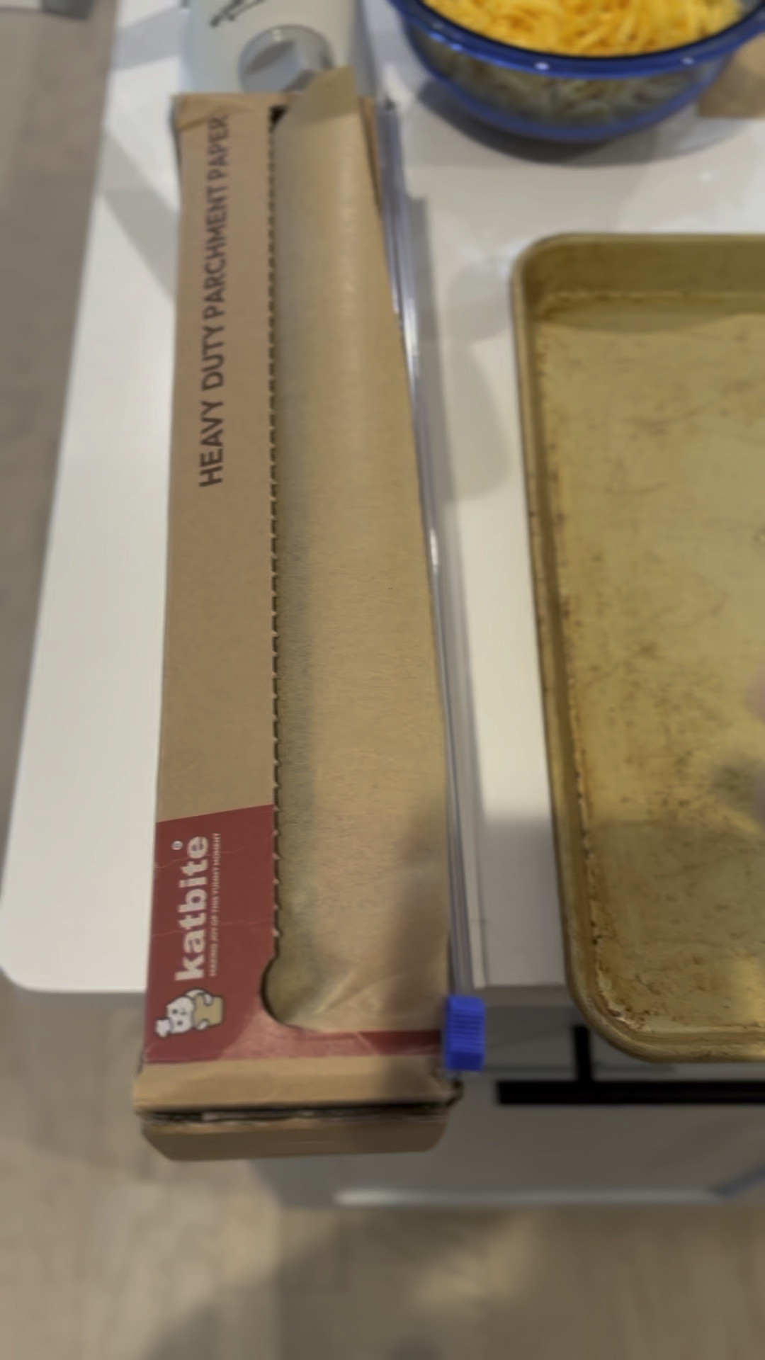 Huge roll of parchment paper that comes with a cutter to slice off the sheet you need. Way easier then trying to tear a piece off!

#LTKHome #LTKVideo