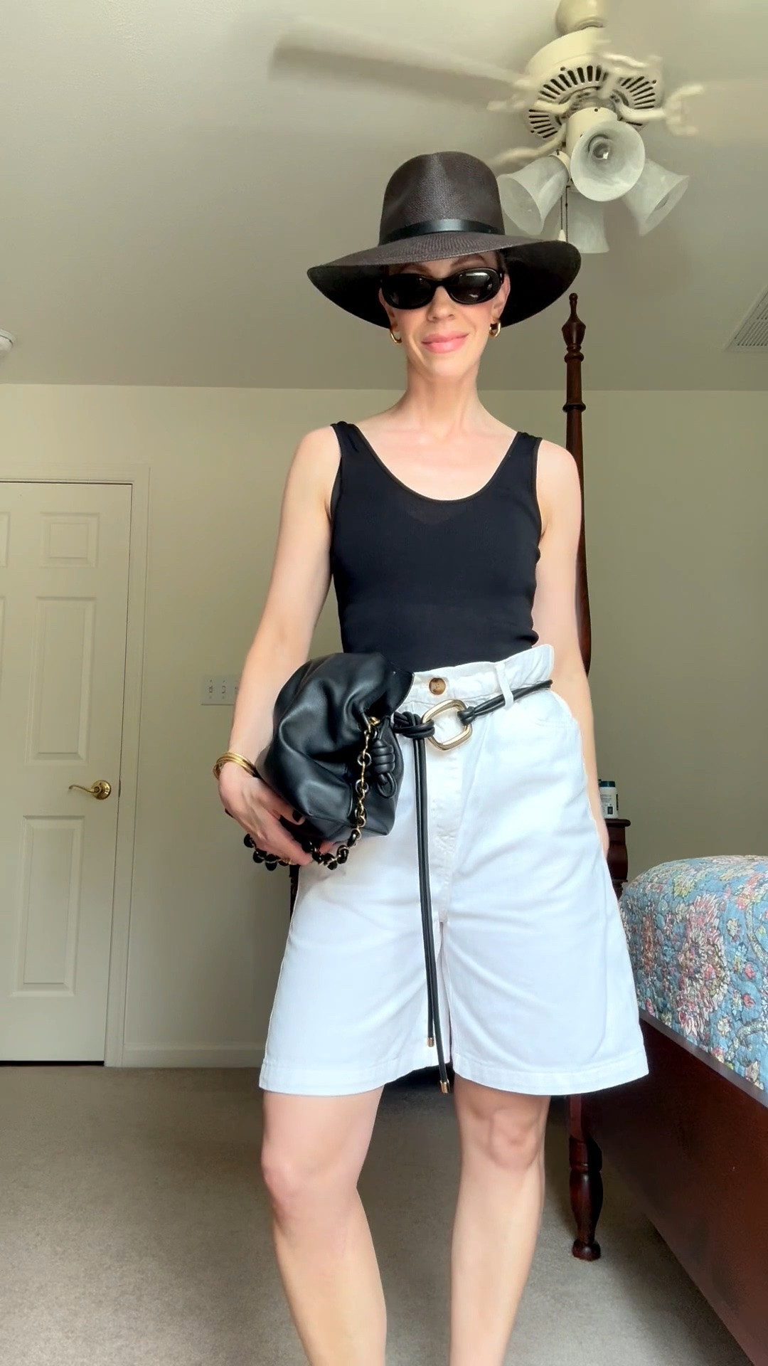 Bermuda shorts are under $30! 

Black and white summer outfit idea with straw hat, tank top, white denim shorts, thong sandals

#LTKSaleAlert #LTKSeasonal #LTKOver40