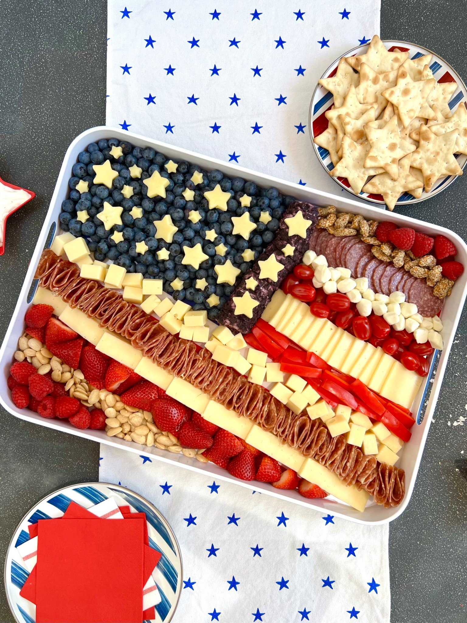 This American Flag Cheese Tray is a cute and clever way to serve a selection of red white and blue snacks for your patriotic party!

#LTKSeasonal