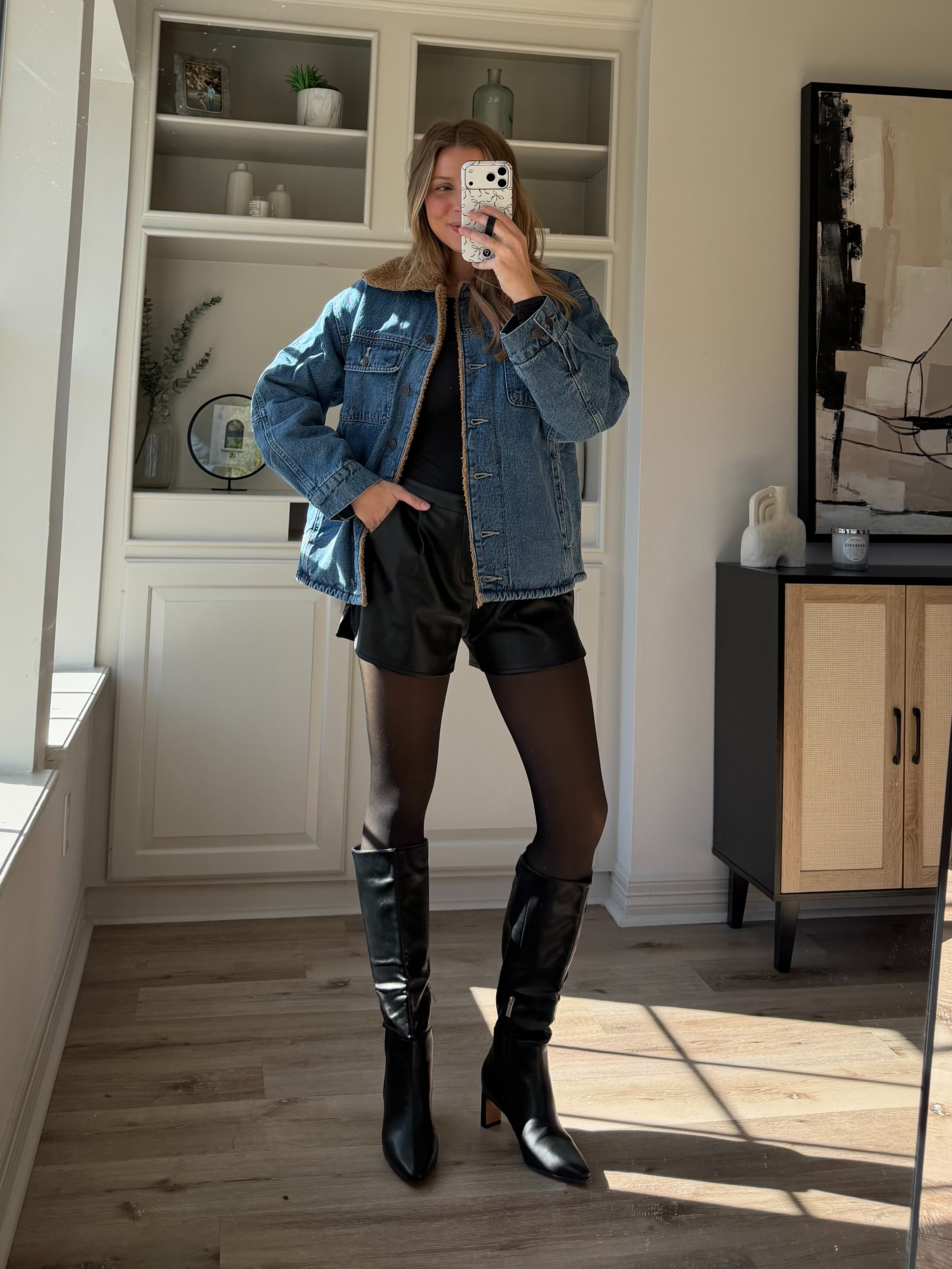 Faux leather shorts with a denim jacket, the cutest chic look! Wearing S in denim jacket, S in long sleeve + M in shorts. 

 #LTKHoliday #LTKootd #LTKFindsUnder50