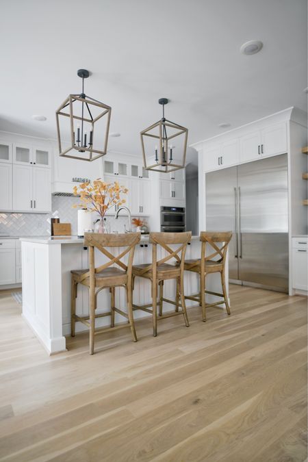 Fall kitchen, fall decor, pendant lights, faux eucalyptus, bar stools.

#LTKhome #LTKSeasonal