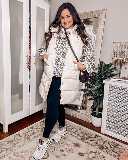 Wearing an L in the long puffer vest
Wearing an L in the black leggings
New balance TTS
Linked similar cheetah print crew neck sweatshirts

Amazon puffer vest, neutral outfit, casual outfit, comfy outfit, neutral sneakers

#LTKshoecrush #LTKFind #LTKcurves