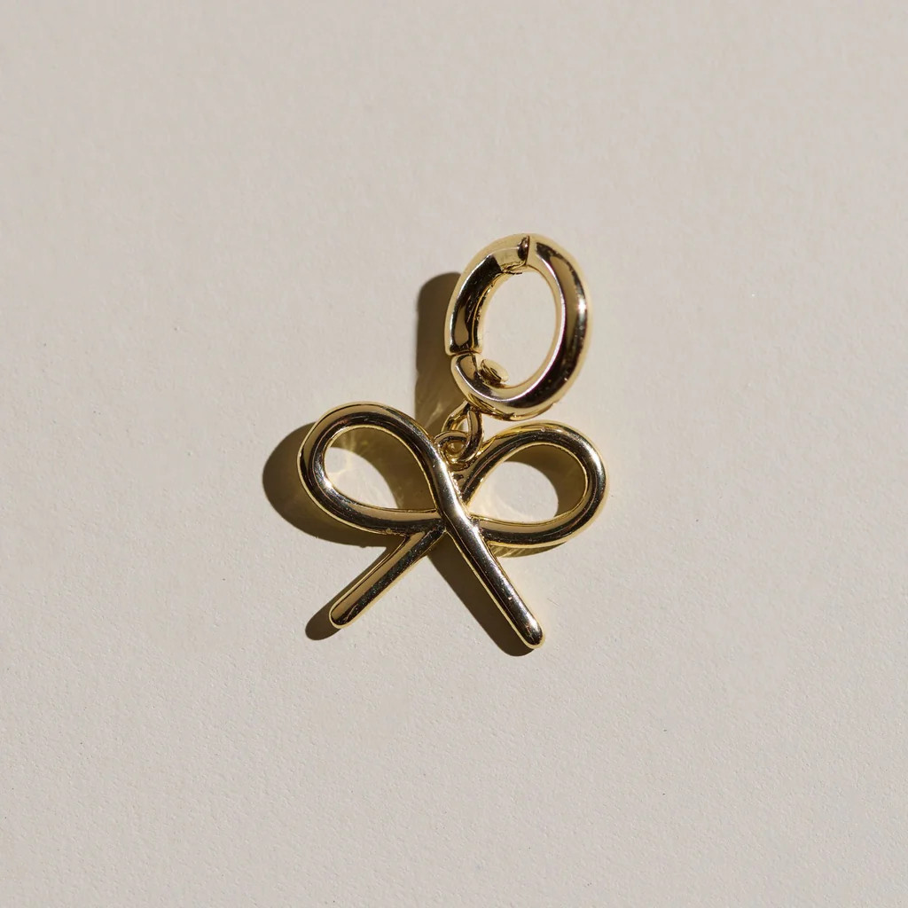 Gold Bow Charm | Nickel and Suede