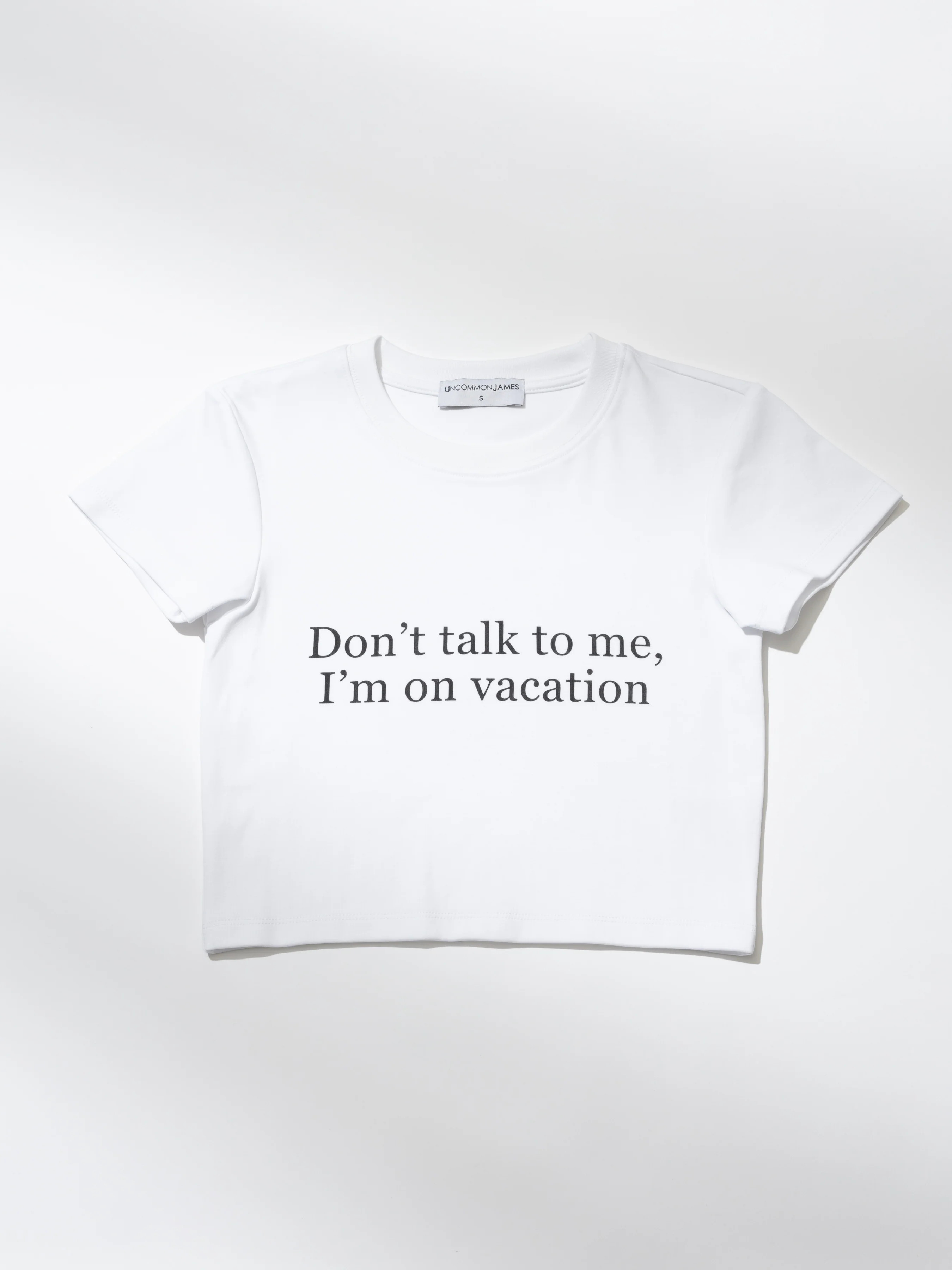 Vacationing Fitted Crop Top in White | Uncommon Lifestyle | Uncommon James