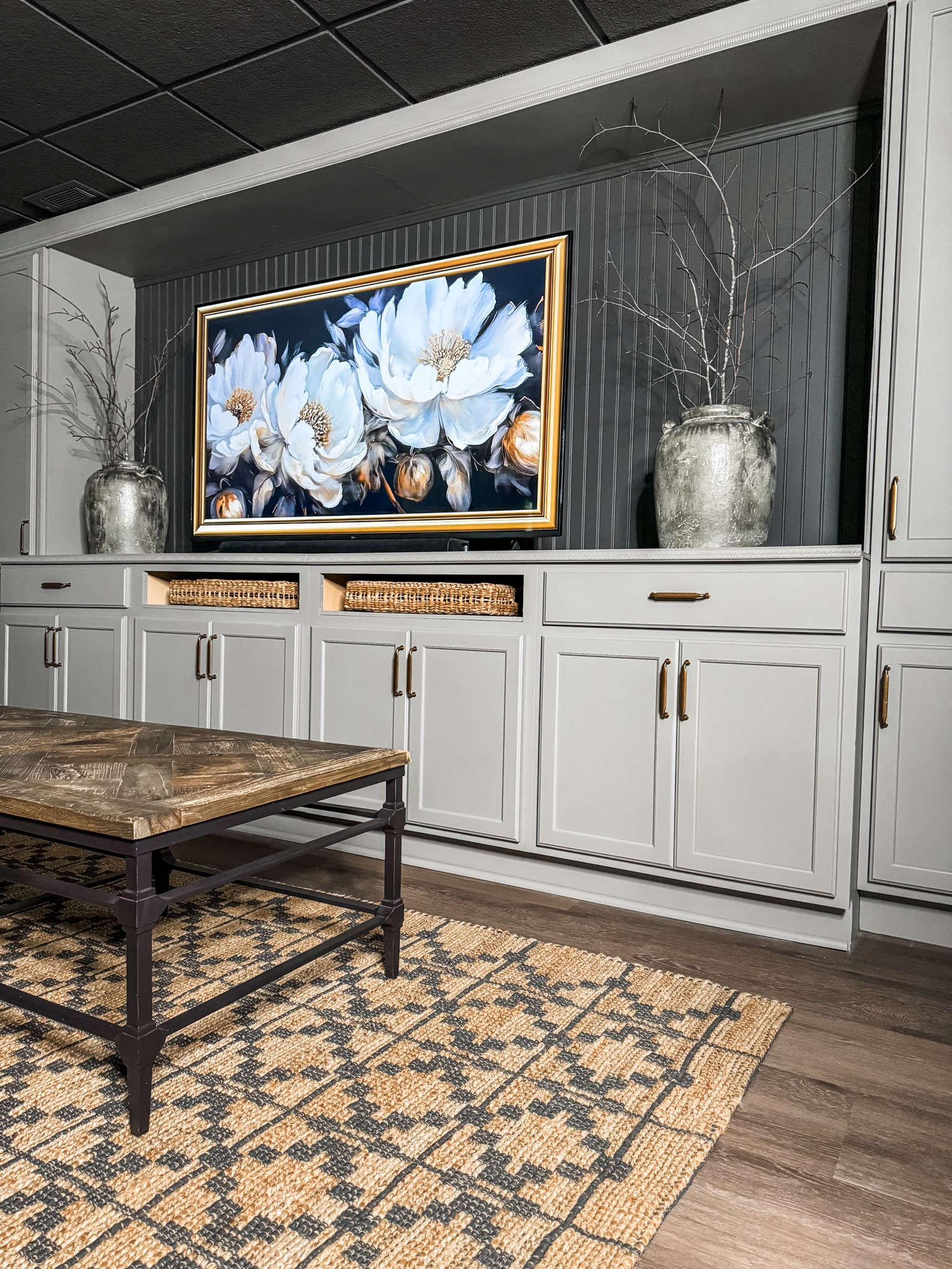 DIY entertainment center is done! Here’s everything I used. Best of luck with your project! 

#arearug #cabinets #hardware #cabinethardware #vase #beadboard #paint 

#LTKStyleTip #LTKHome #LTKFindsUnder100