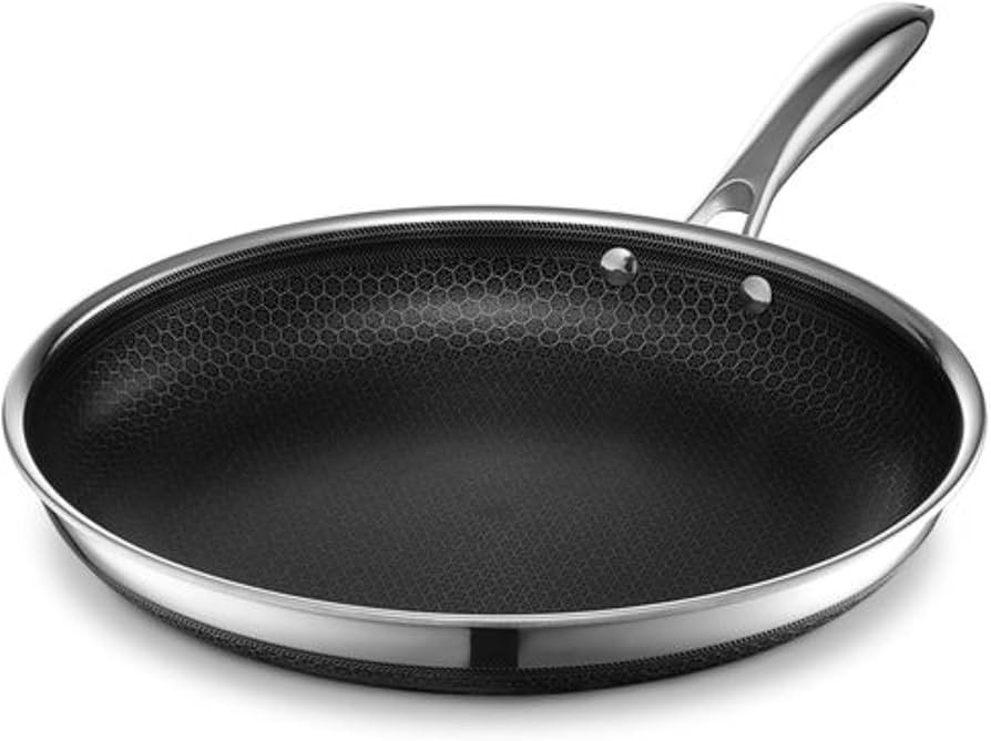 HexClad Hybrid Nonstick Frying Pan, 12-Inch, Stay-Cool Handle, Dishwasher and Oven Safe, Inductio... | Amazon (US)