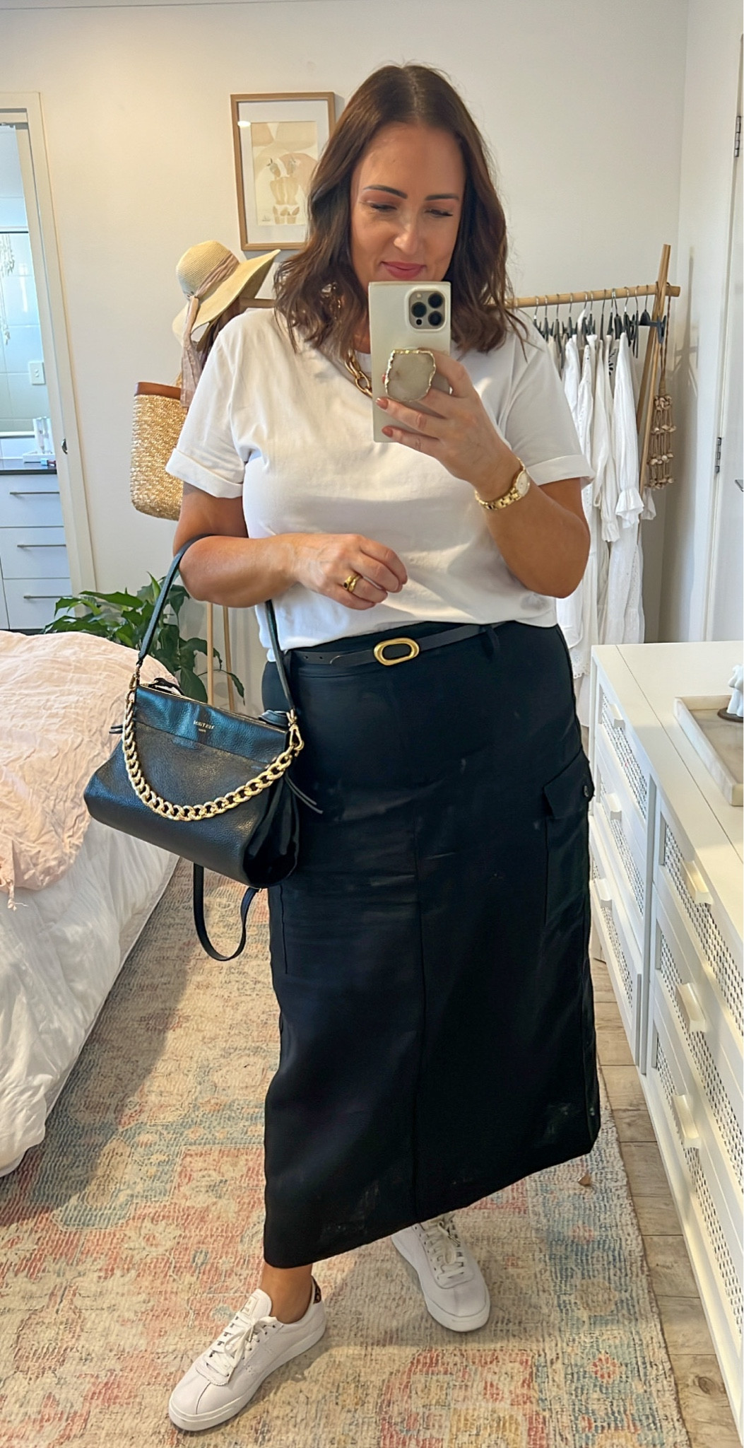 Weekend Look 🖤
It’s all about great basics & this Tee is the perfect addition to a great foundational wardrobe. I showcased this linen skirt in my last post and you all loved it! It’s the perfect style for the transition to the warmer weather. 
I’m wearing the XL in the Tee & 16 in the skirt! 

#LTKcurves #LTKover40 #LTKstyletip