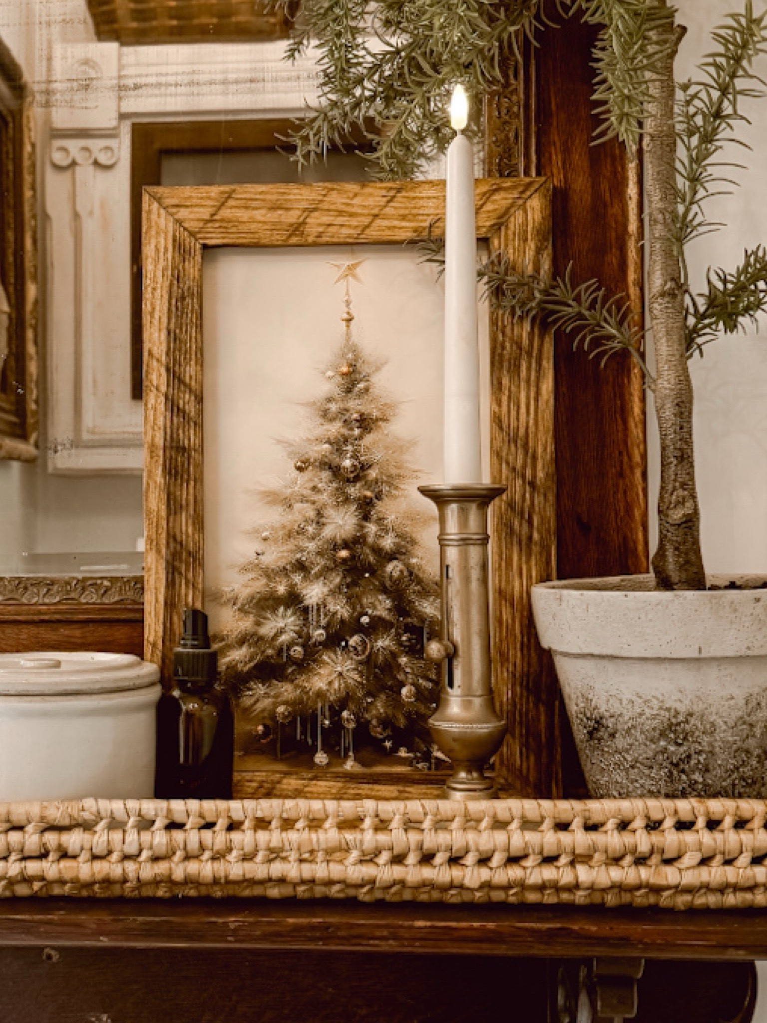 I just added a new shelf in our bathroom and decorated it for Christmas. I added one of my favorite vintage brass candle holders, a small potted Christmas Tree, a new Christmas print, and rattan basket tray. I love how it all came together in this small space. 

#LTKHoliday #LTKHome #LTKSeasonal