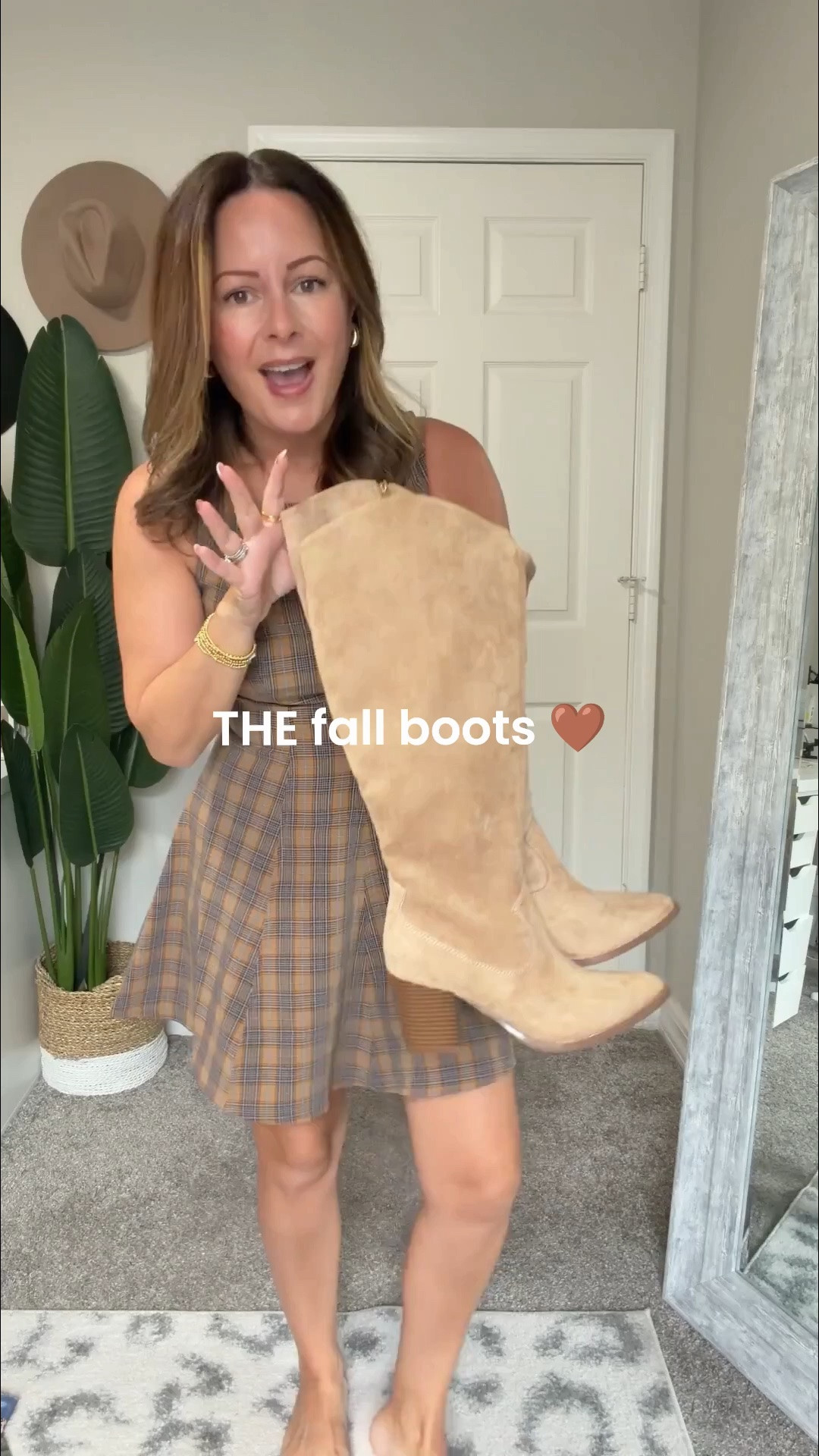The boots that instantly make an outfit feel like fall 🤎 Love the neutral suede look, western-inspired shape + heel height. Styled here with the cutest plaid mini dress! Linking the full look.