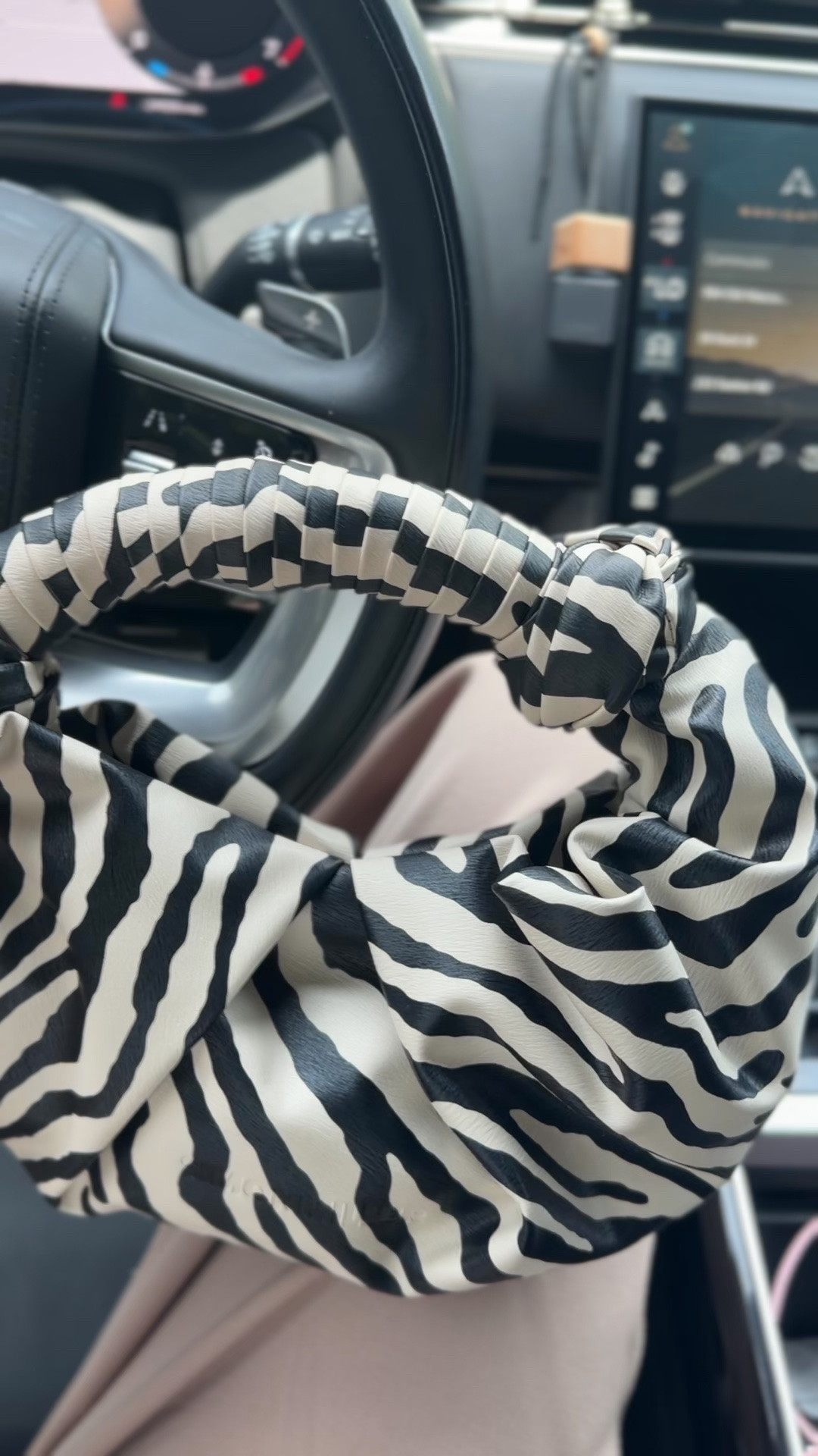 This bag is so cute. It reminds me of the zebra bottega pouch version. It has a magnetic closing. ￼

#LTKootd #LTKdayinmylife #LTKgrwm