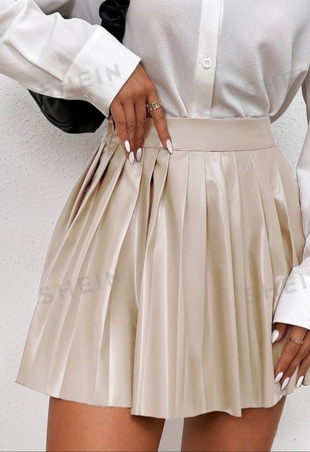 Pleated high waist pleather mini skirt for Petite women.

#LTKfindsunder50 #LTKstyletip