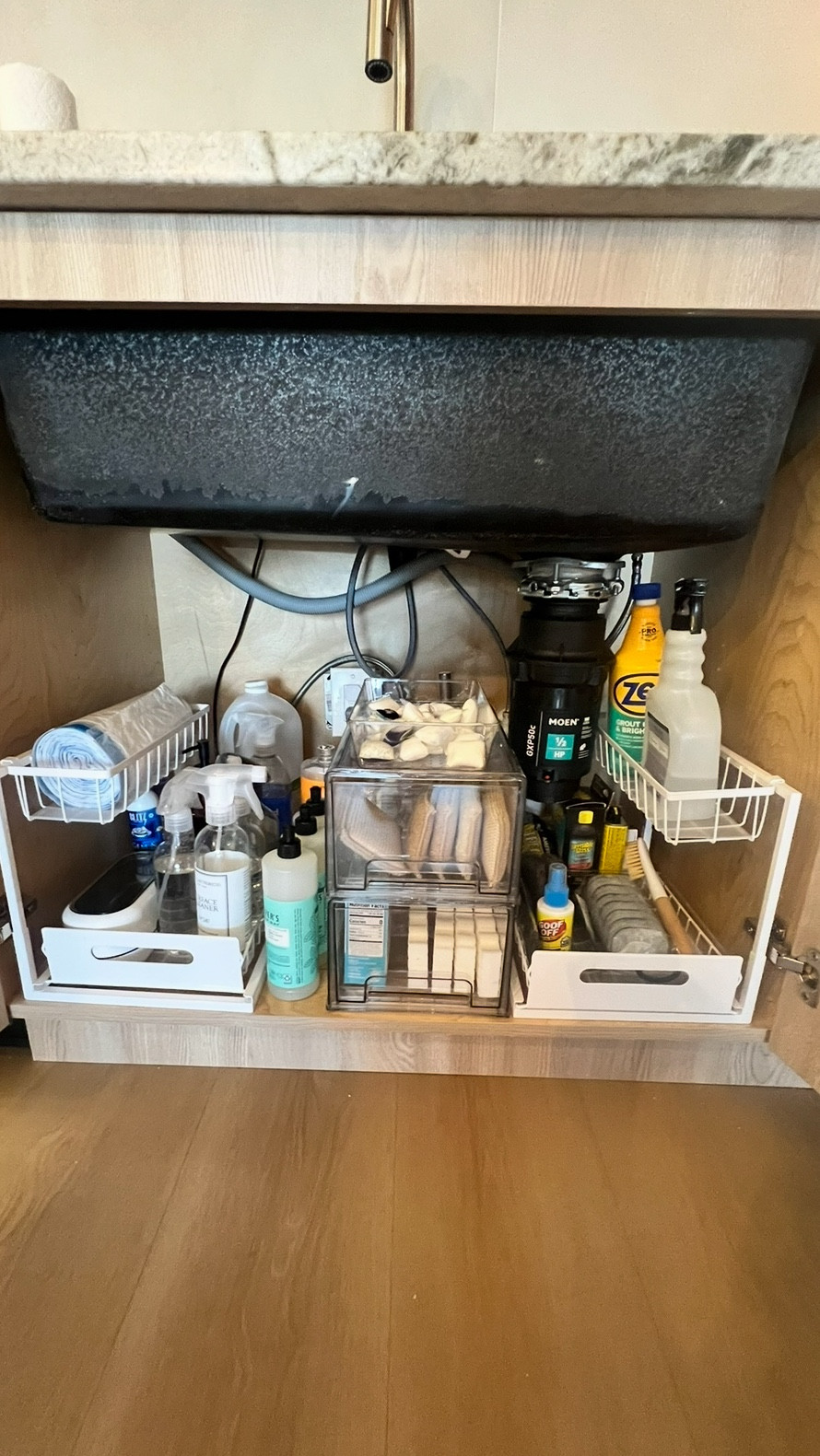 Under sink organization system I use for clients. Acrylic drawers, side caddies, and structured containers that maximize vertical space and make everything easy to grab. All pieces linked.

#LTKHome