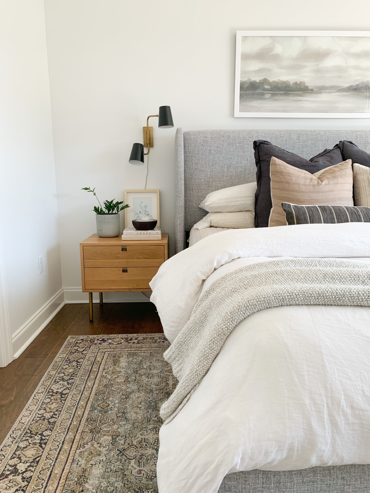 Still one of my most favorite views, a couple of years in. Love our neutral bedroom with grey bed and solid wood nightstands. 
Designer @2540loveandco

#LTKhome