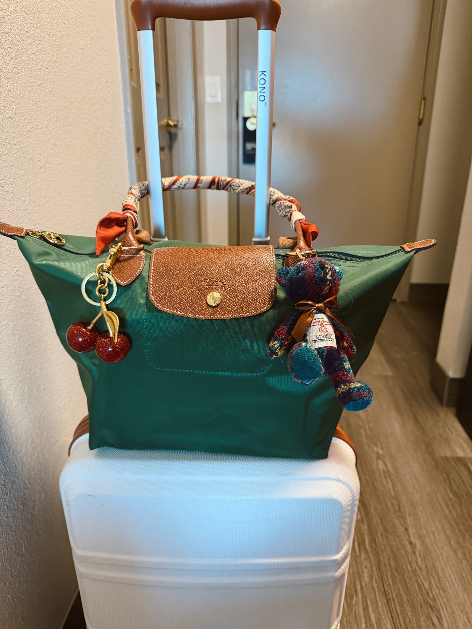 Another travel day 🛣️ 
The Longchamp medium le Pliage tote is perfect for traveling. This coach inspired cherry bag charm is under $10 on Amazon!
This is the carry on I use for every trip. I got it in a luggage set also from Amazon. My bag handle scarf is also from Amazon from an cool bulk package of Willy scarves 
Harris tweed bear bag charm


#LTKTravel #LTKGiftGuide #LTKItBag