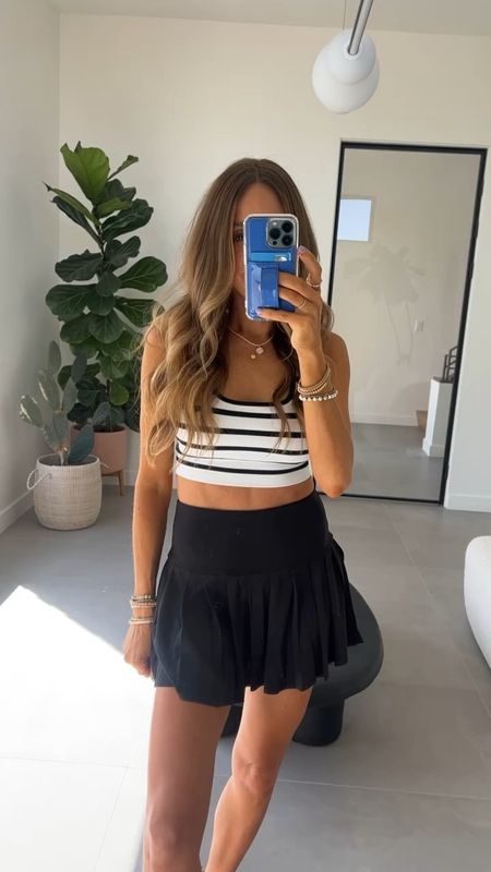 I LOVE pleated skirts! Especially in the summer! This one is so cute and is under $25! Wearing a small!

#LTKFindsUnder50 #LTKActive