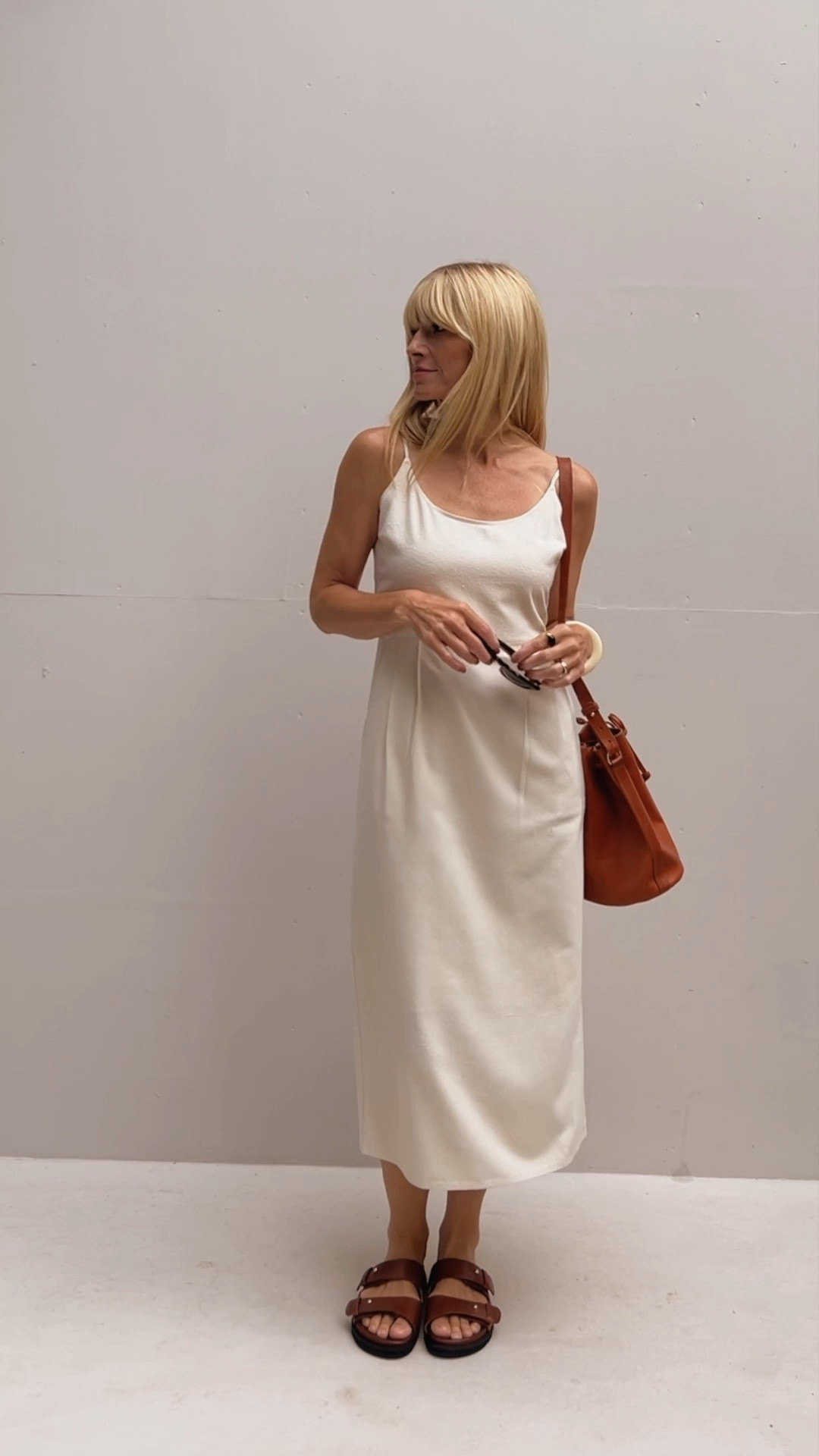 White strap maxi dress, brown sandals, crossbody bag, brown blazer, black tote bag, black mules, white shirt, black crossbody bag 

#LTKtravel #LTKSeasonal #LTKeurope