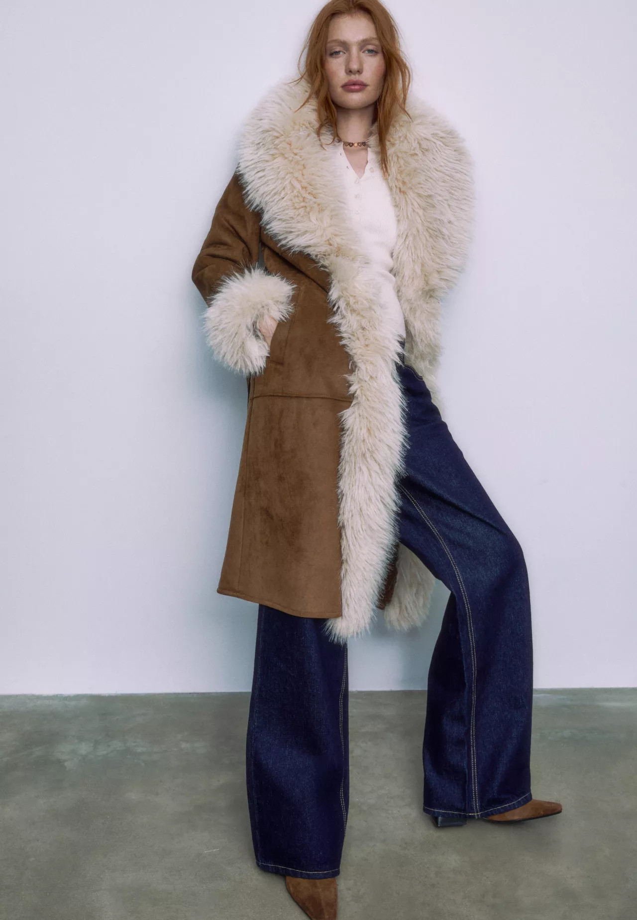 Langer Mantel mit zotteligem Kunstfell - Mode für Damen | Stradivarius Deutschland | Stradivarius DE