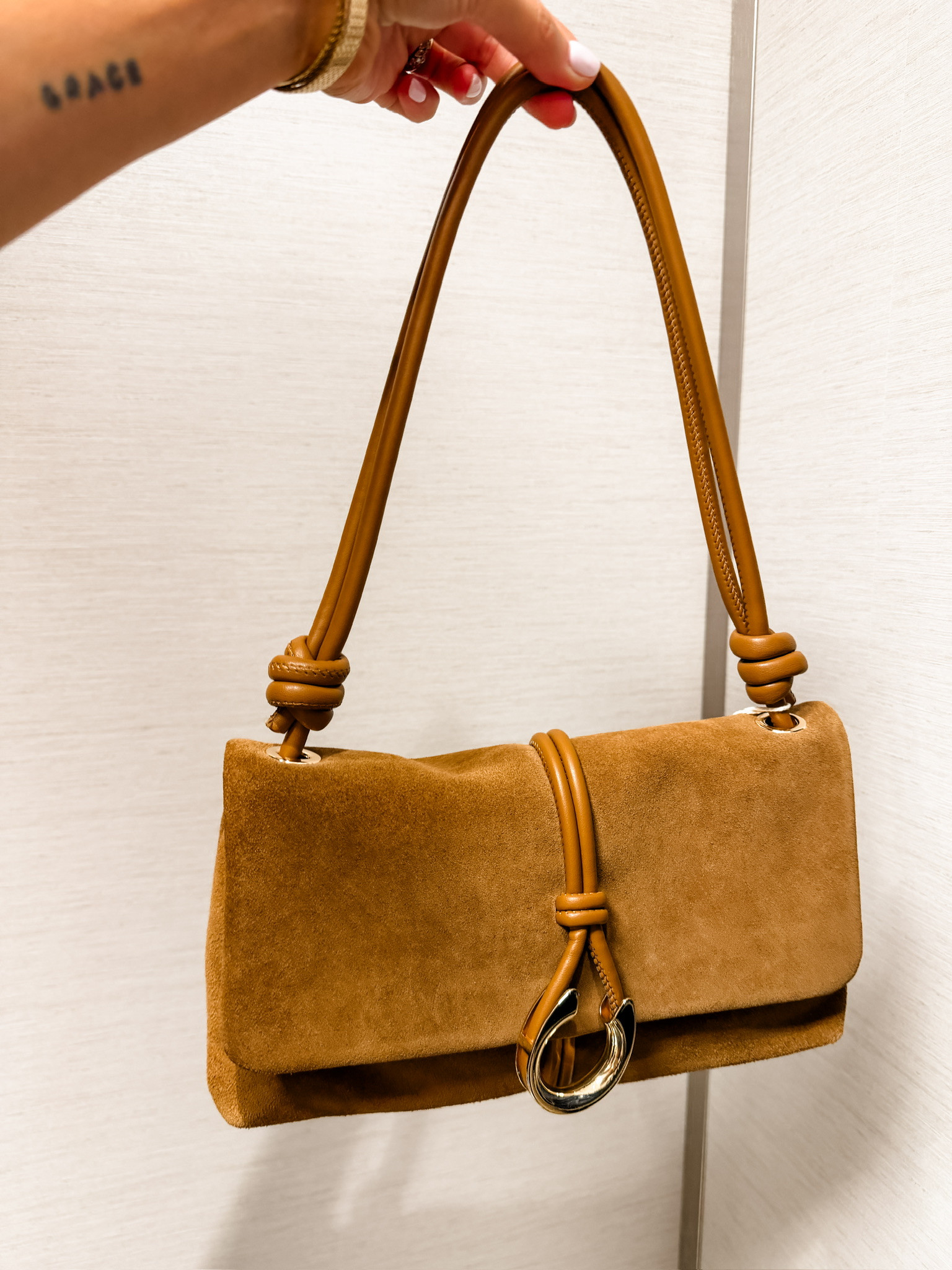 The details on this faux suede neutral shoulder bag! 😍 This will be a staple fall purse, and one you can wear for years! Currently a part of the Nordstrom Anniversary sale!

Loverly Grey, Nordstrom anniversary sale, NSale, dolce vita, faux suede purse, faux suede shoulder bag, fall staples 

 #LTKSeasonal