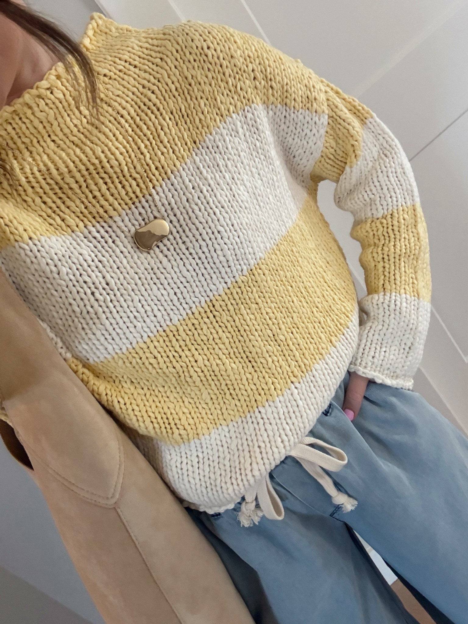 A perfect spring sweater! I wanted a more oversized fit, so sized up to a medium 

Knit sweater, yellow and white stripe sweater, pull on denim, electric picks, spring style 

#LTKootd